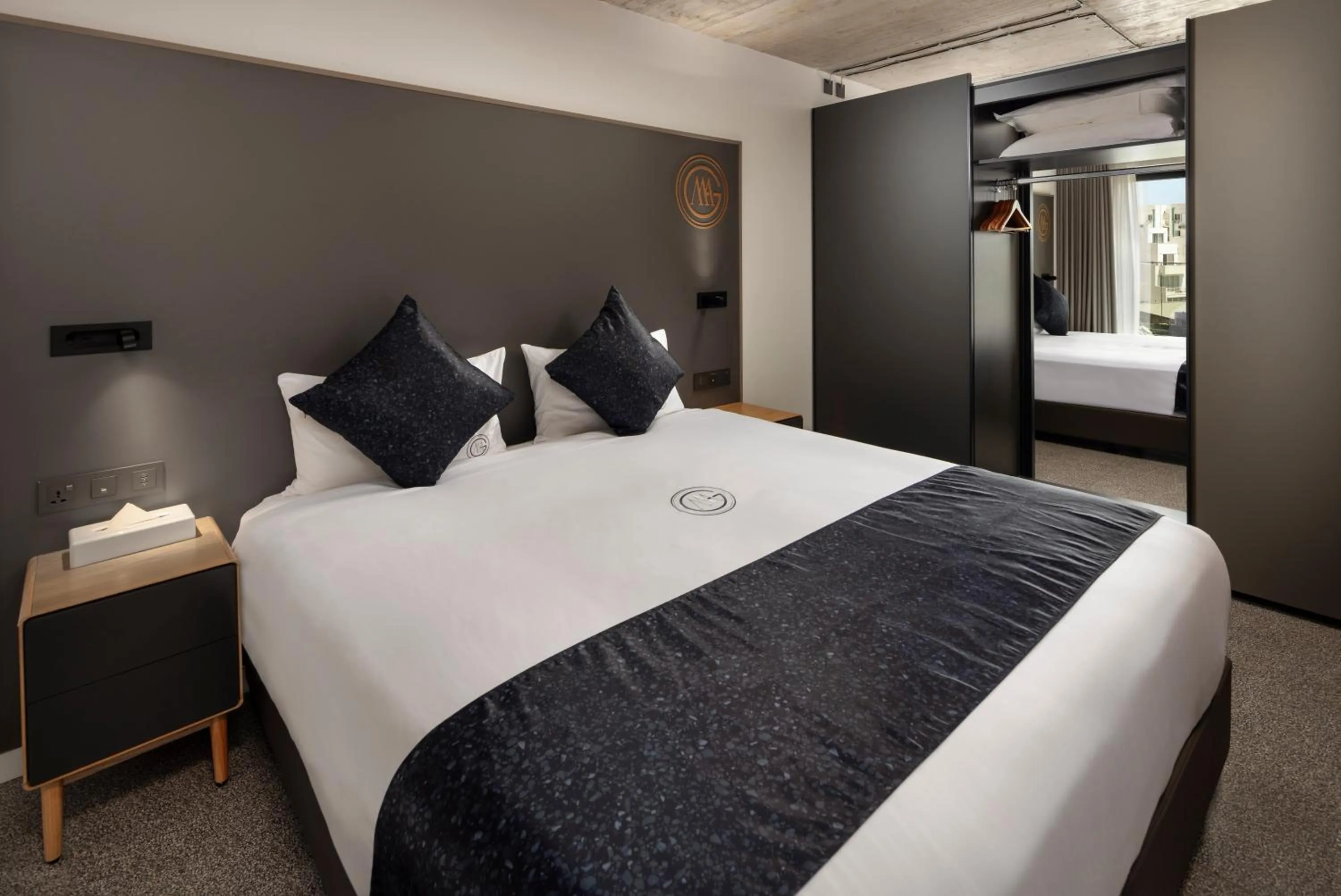 Bed in Grands Suites Hotel and Spa Sliema