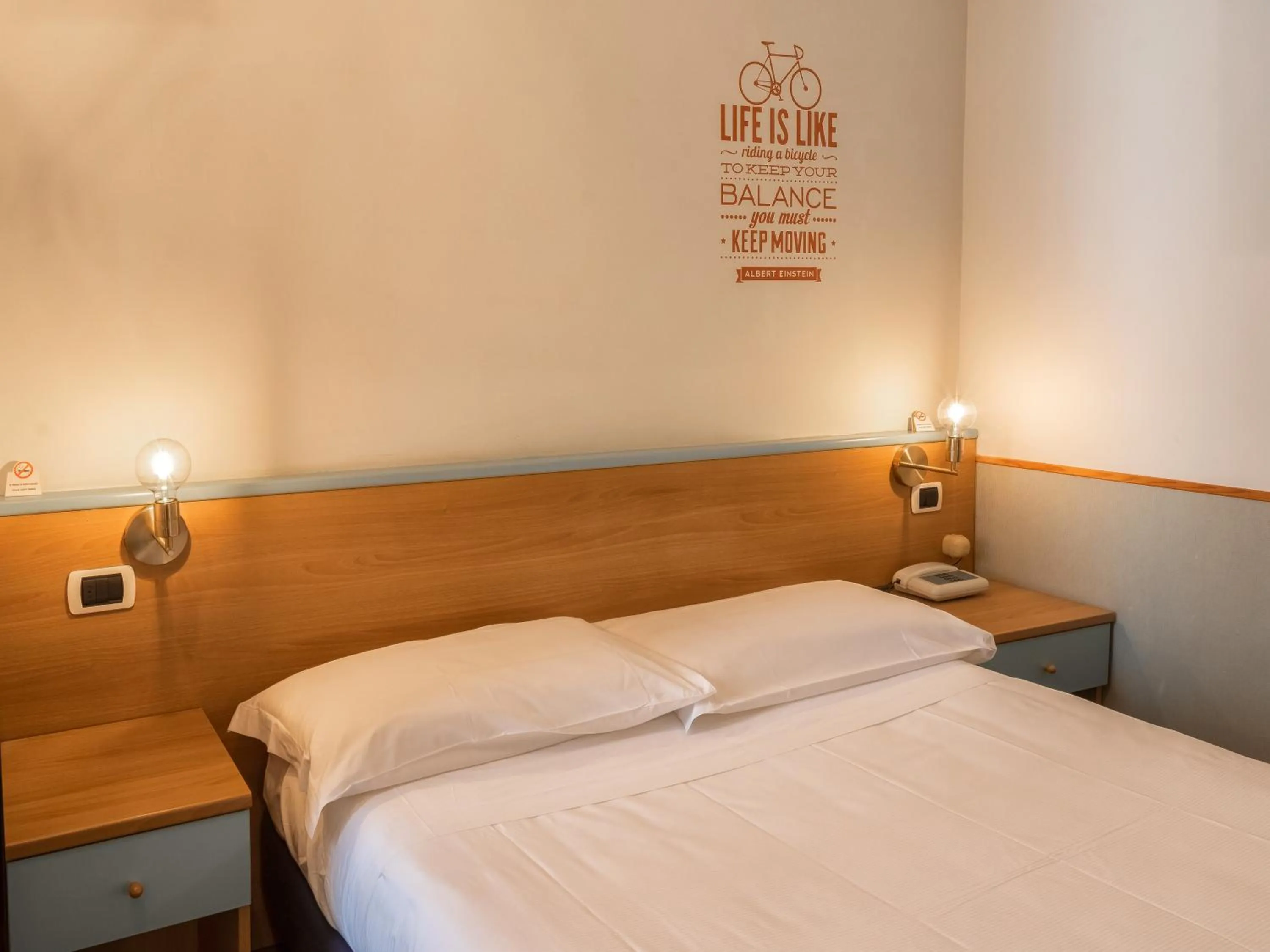 Bed in Hotel Napoleon Susa