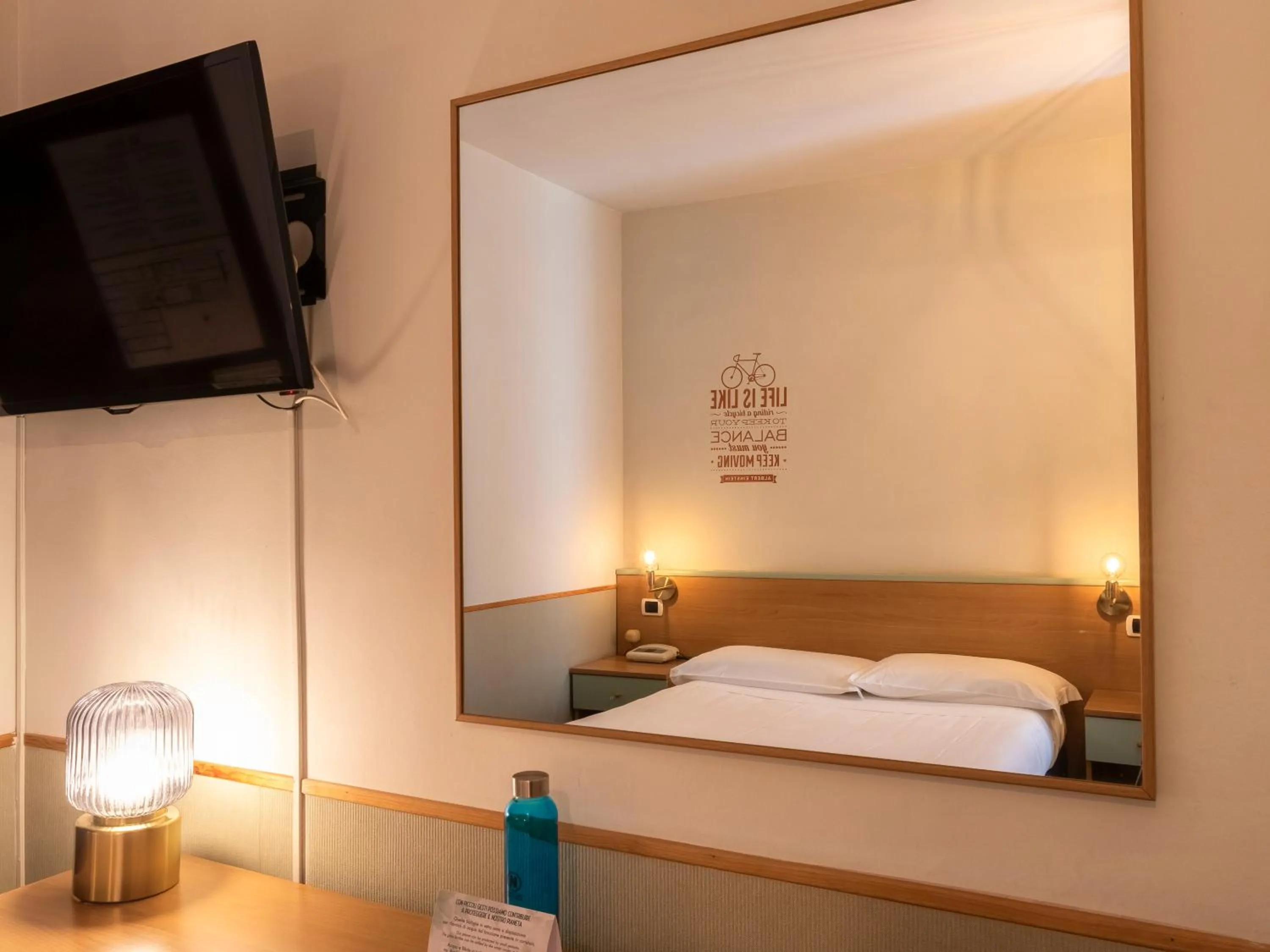 Bed in Hotel Napoleon Susa