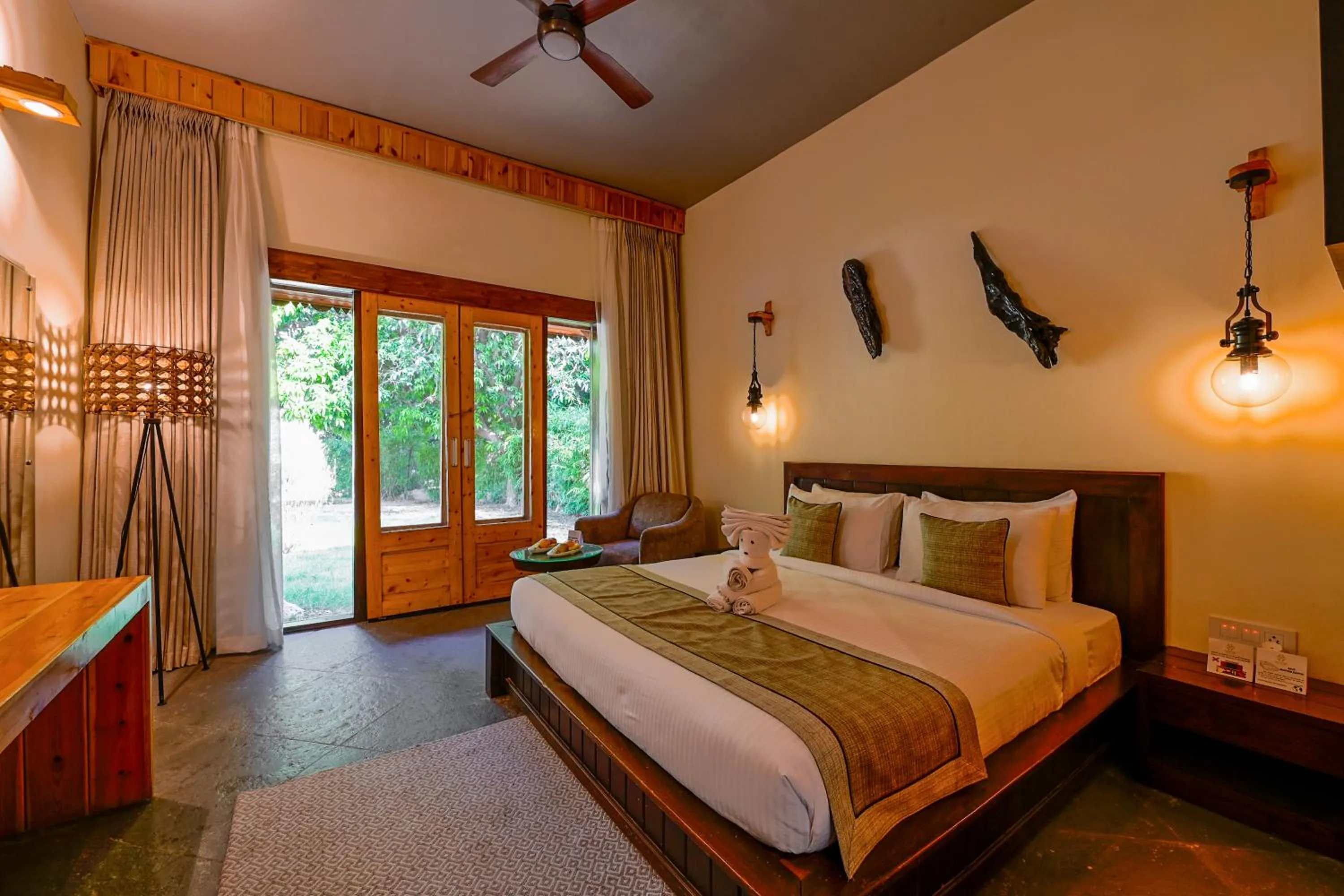 Bed in Tarangi Resort and Spa