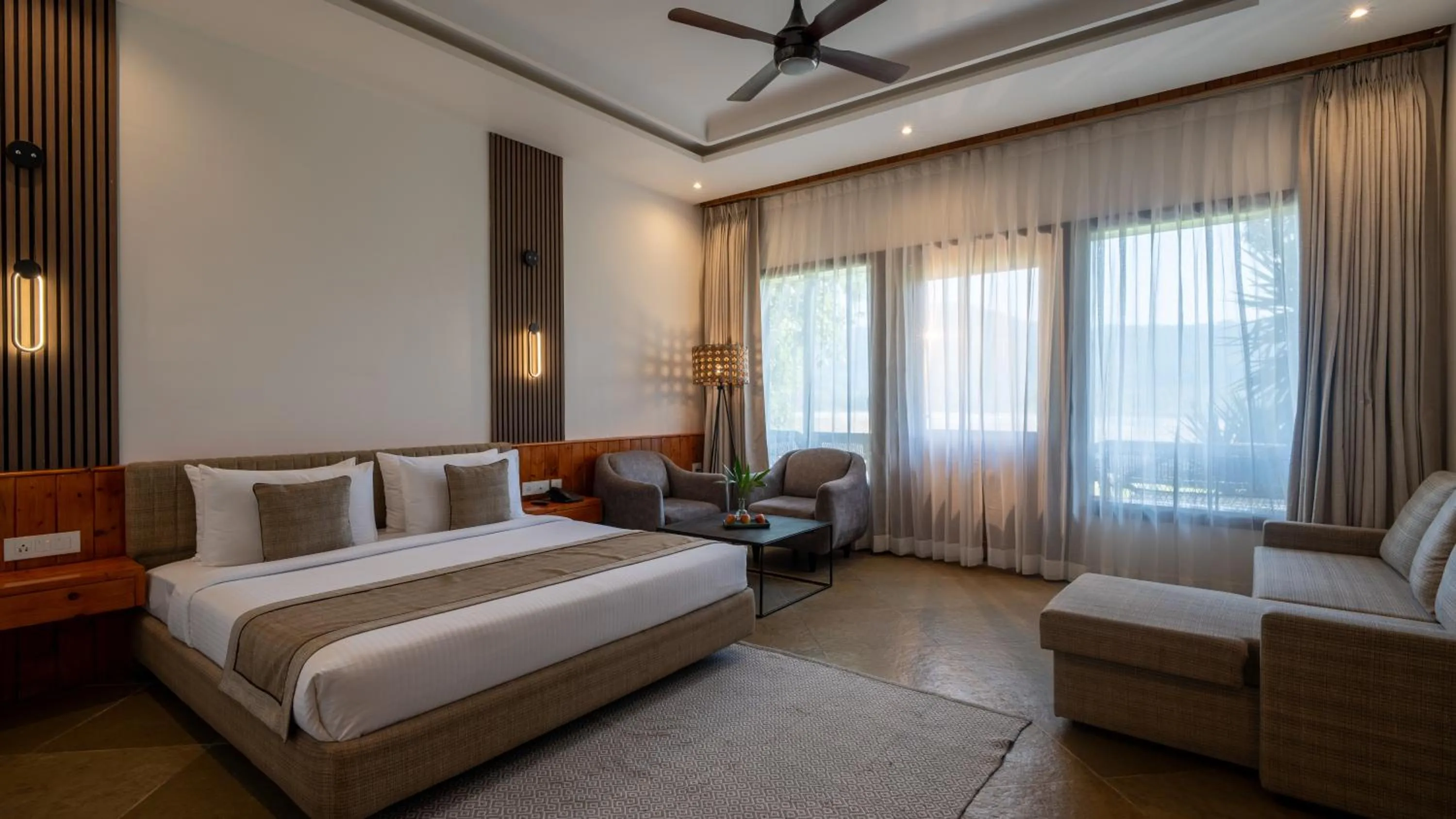 Bed in Tarangi Resort and Spa