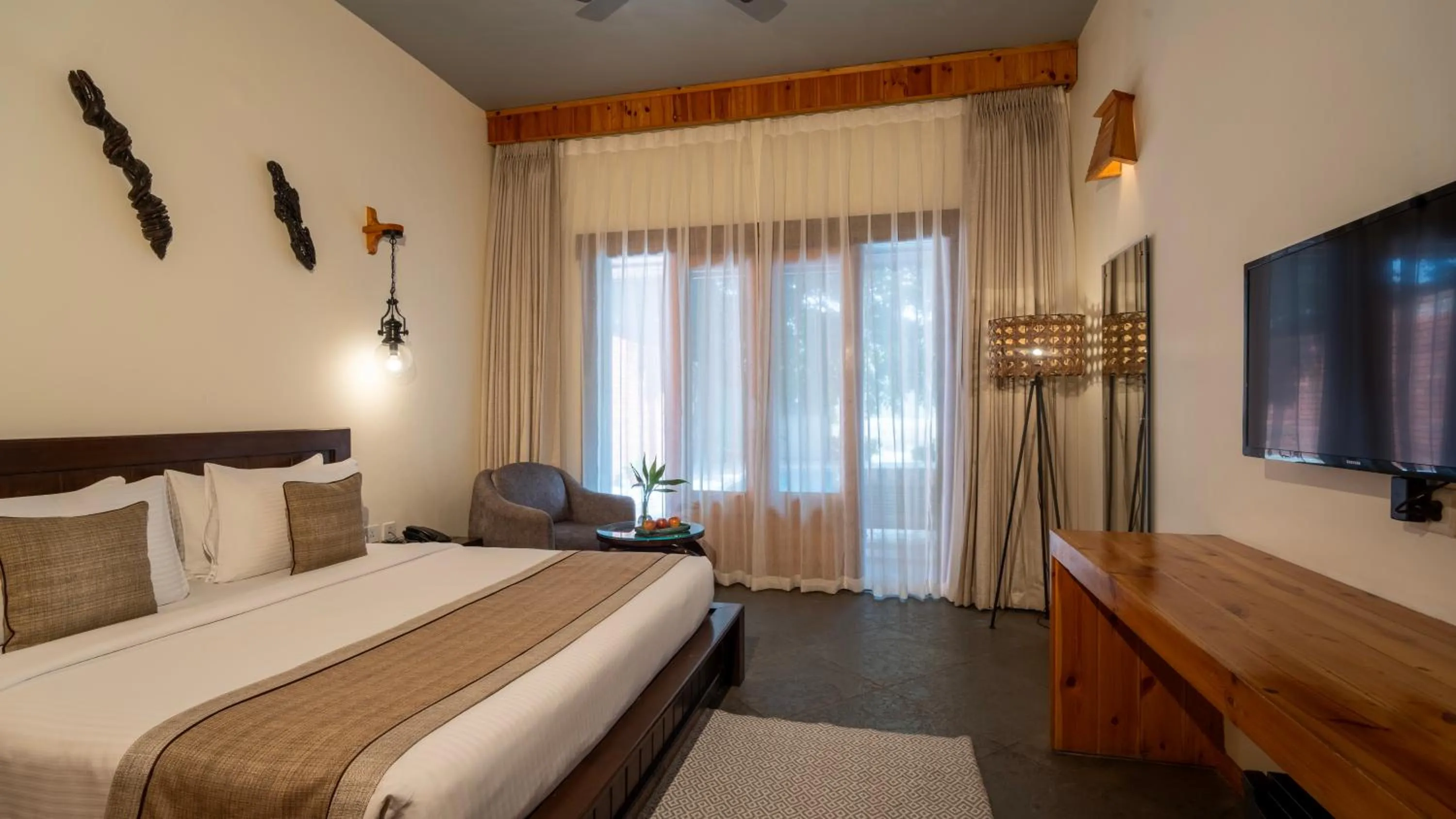 Bed in Tarangi Resort and Spa
