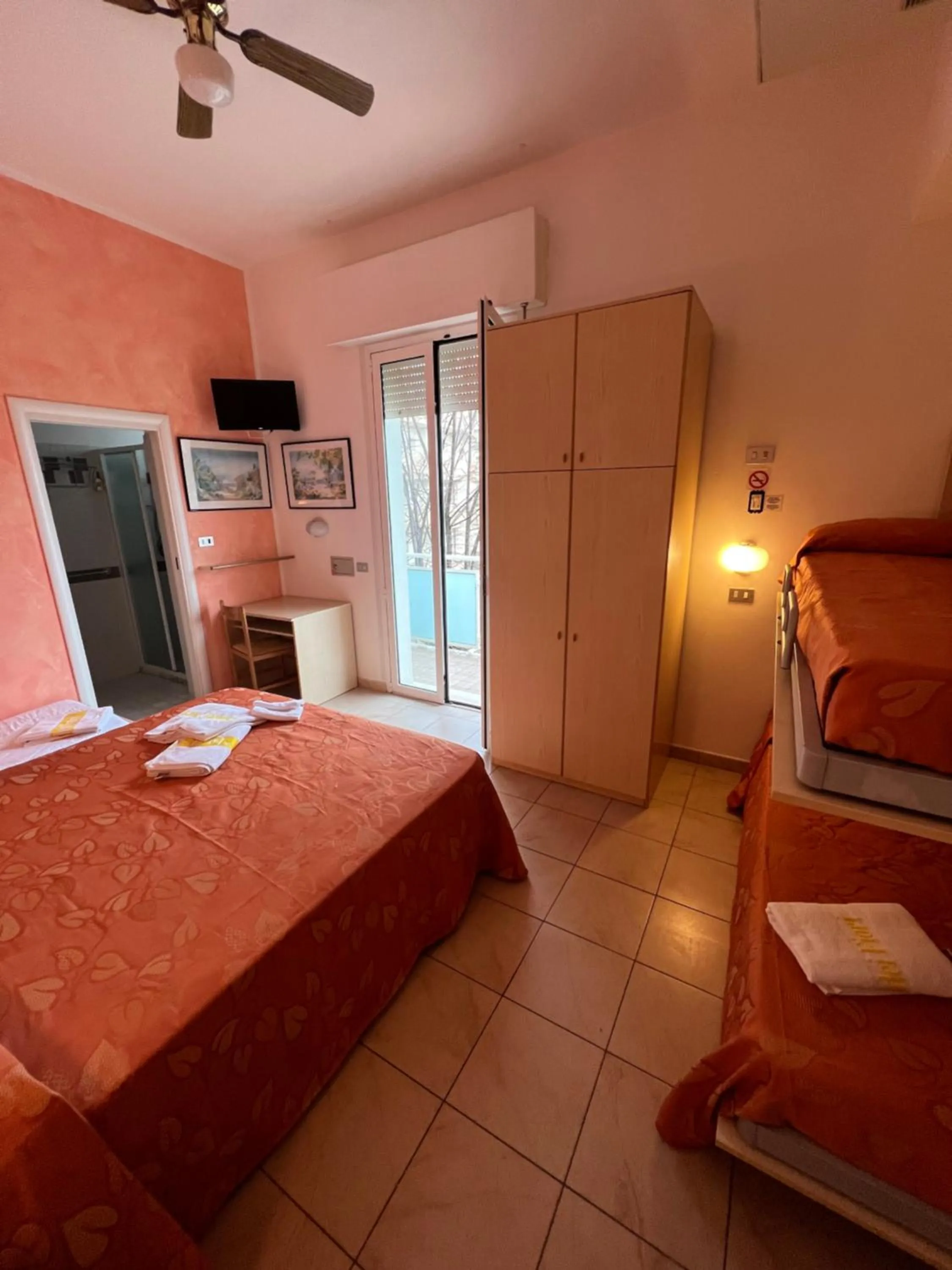 Photo of the whole room, Bed in Hotel Villa dei Fiori - sul mare con piscina