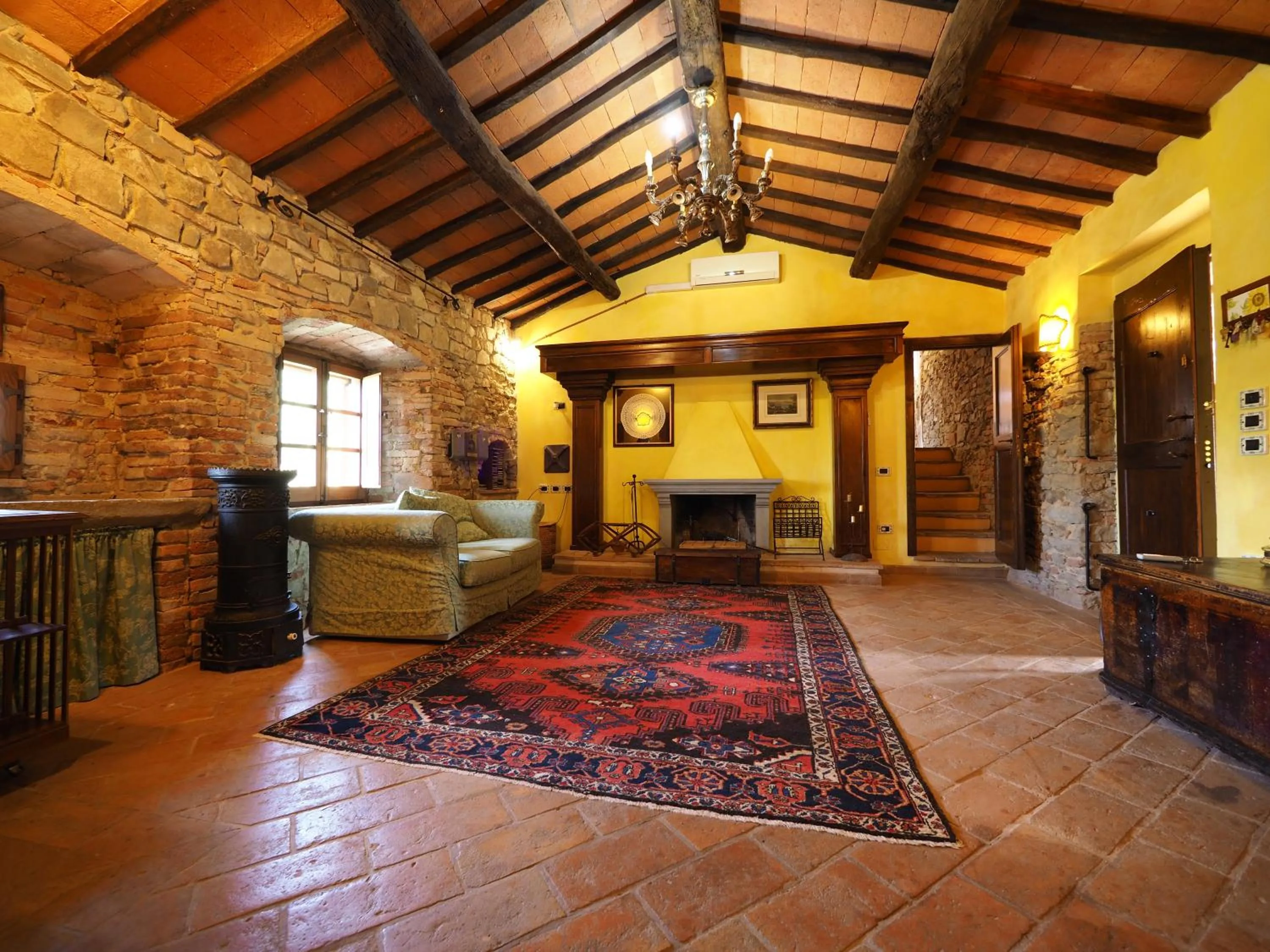 Communal lounge/ TV room in EcoResort Il Cantico della Natura