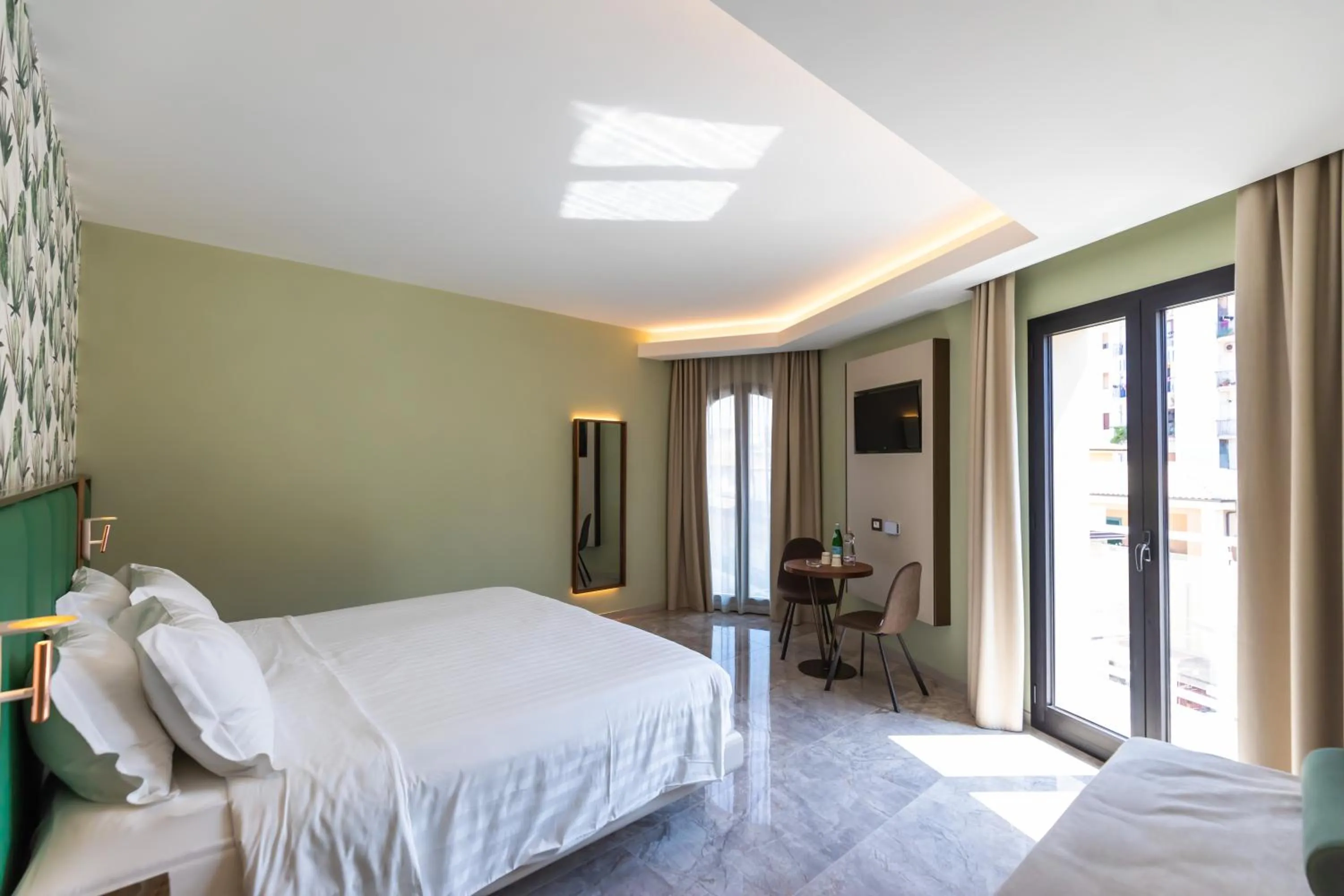 Bed in SOLMARIS TROPEA City Center - Rooms & Suites - Private Parking