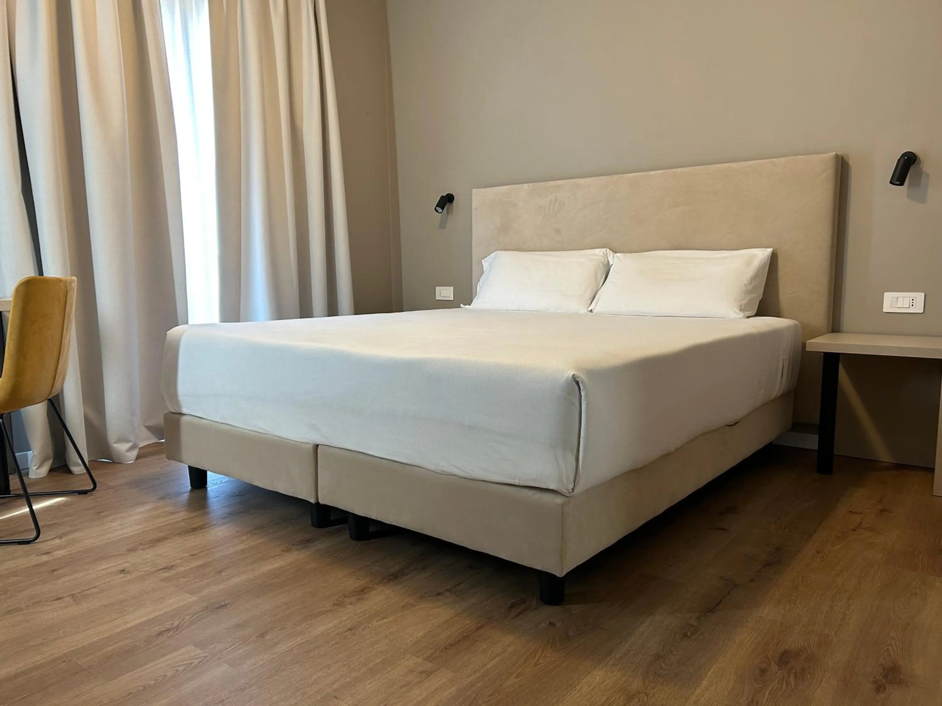 Bed in Hotel Pomara