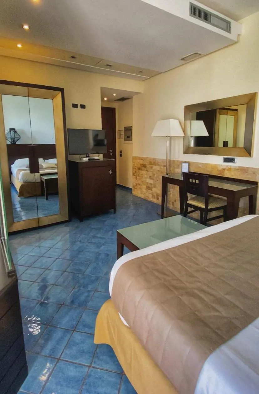 Bed in Hotel La Lucertola