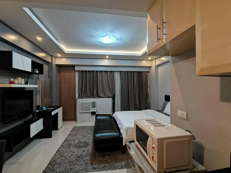 Bed in palm tree villas