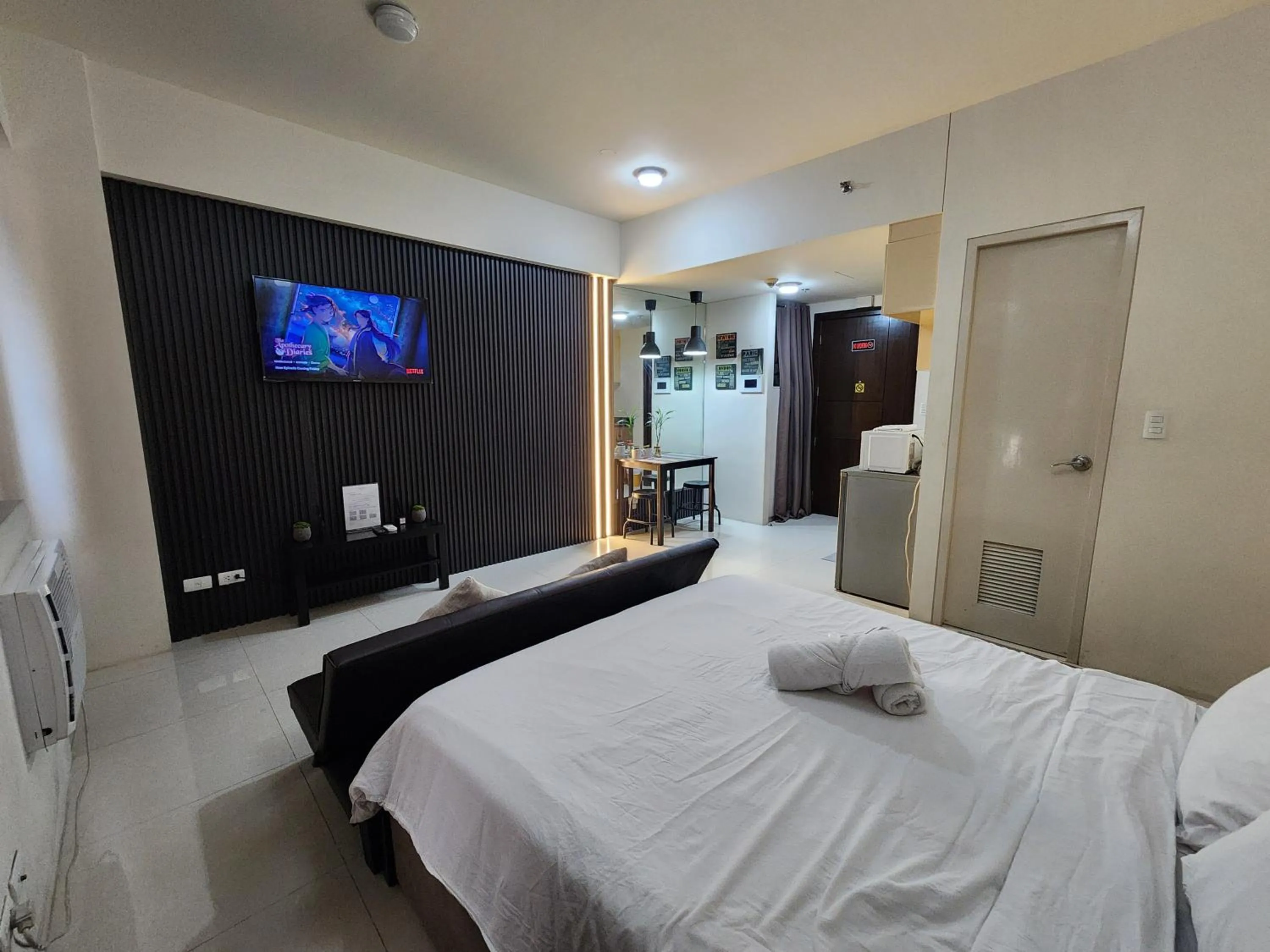 Bed in palm tree villas