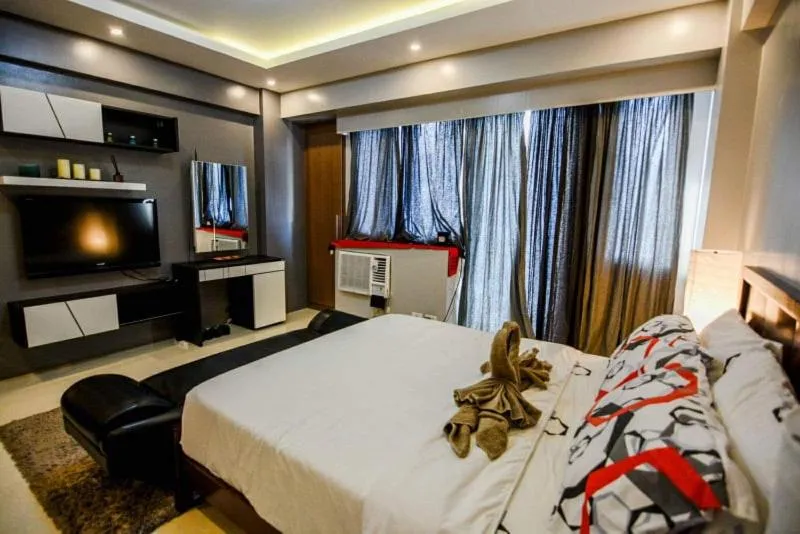 Bed in palm tree villas