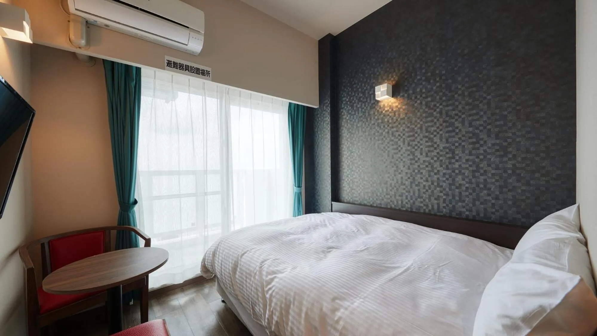 Photo of the whole room in New Normal Condo in NAHA AIRPORT ニューノーマルコンドイン那覇エアポート