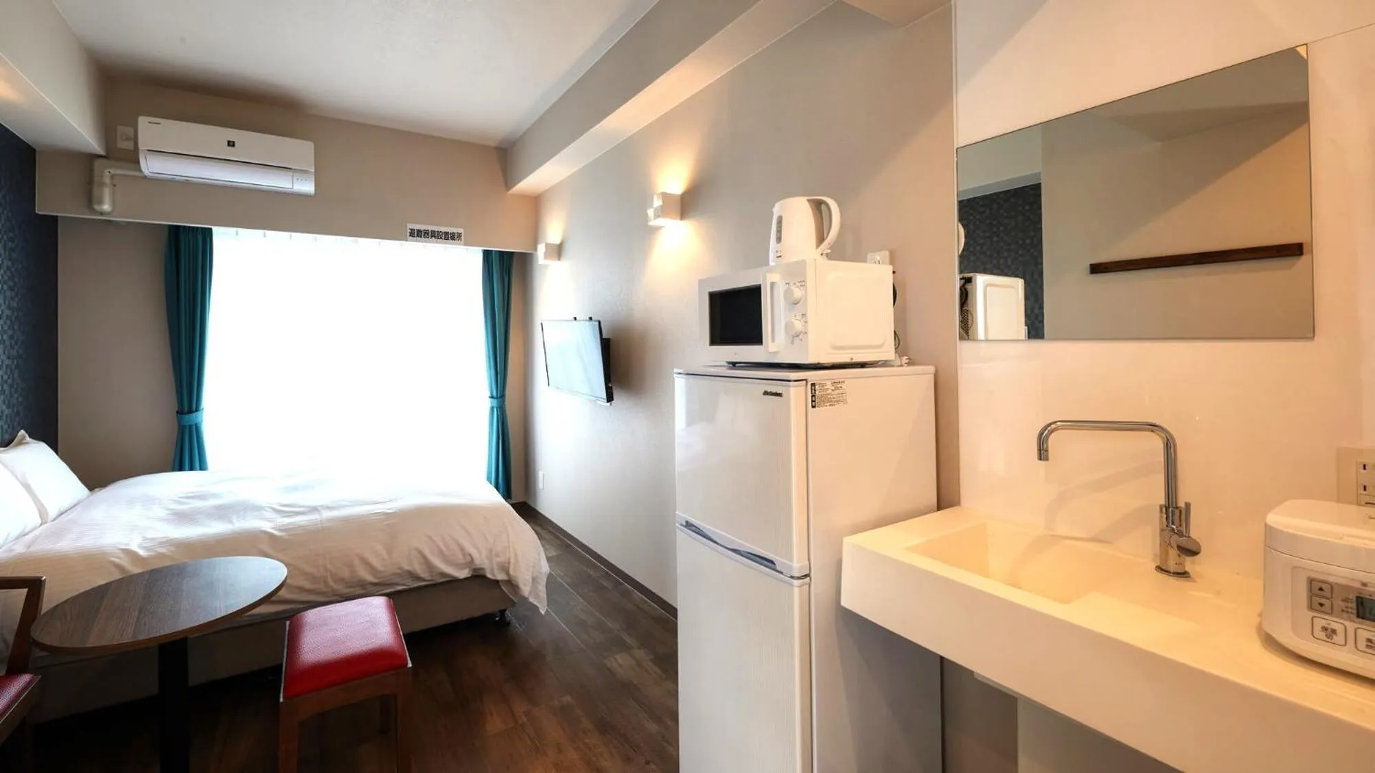 Kitchen or kitchenette in New Normal Condo in NAHA AIRPORT ニューノーマルコンドイン那覇エアポート