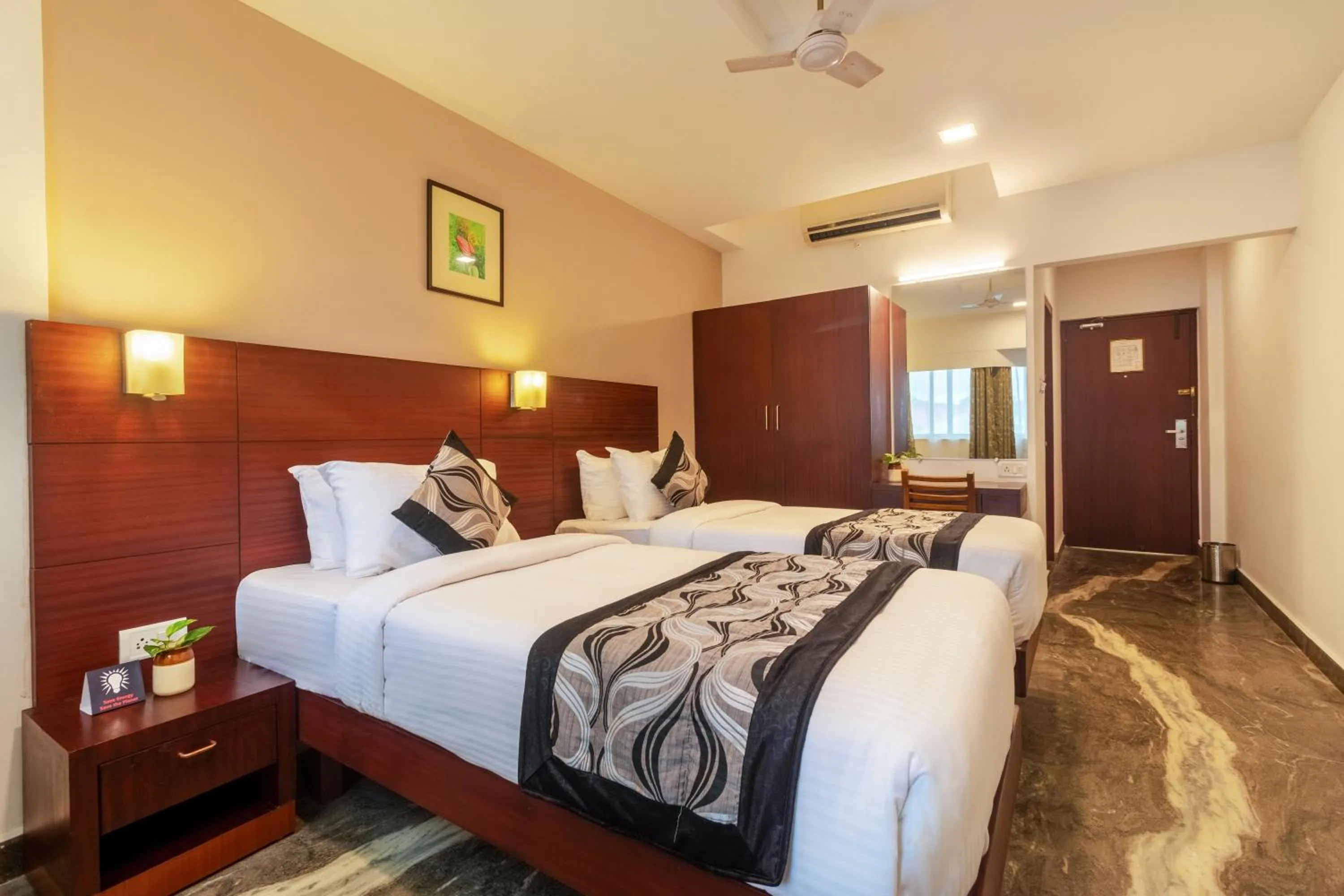 Photo of the whole room, Bed in Zip By Spree Hotels Mangala Towers Thrissur