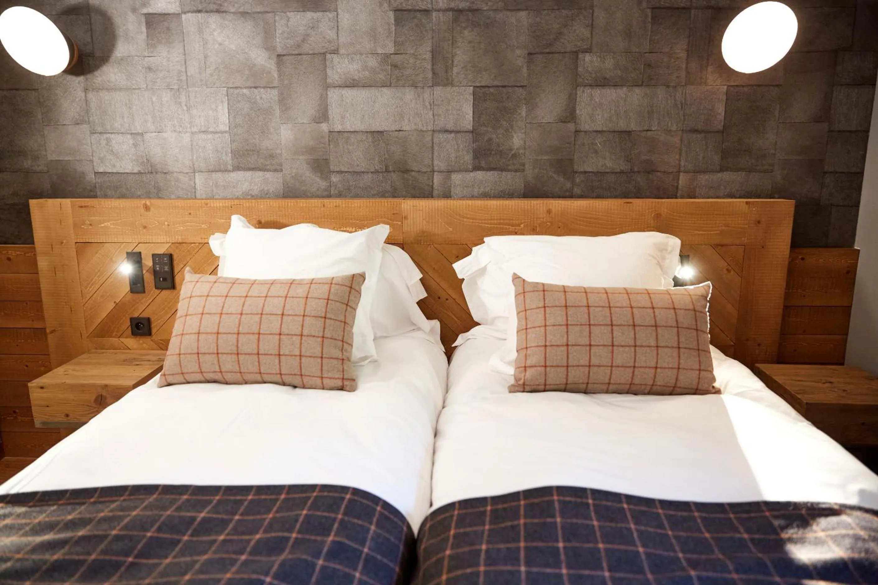 Bed in Pure Montagne Resort & Spa