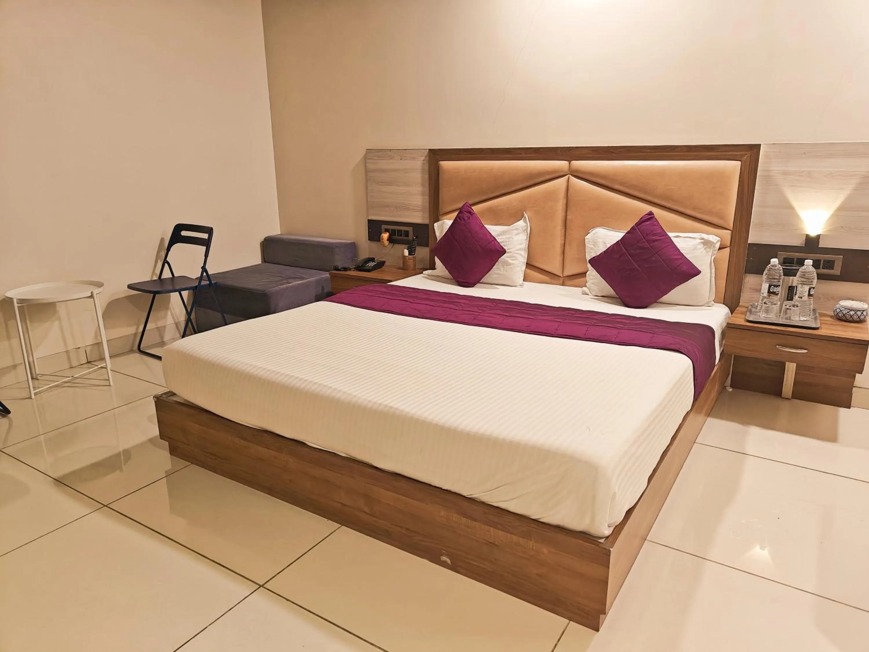 Bed in Passiflora Beach Resort Alibaug