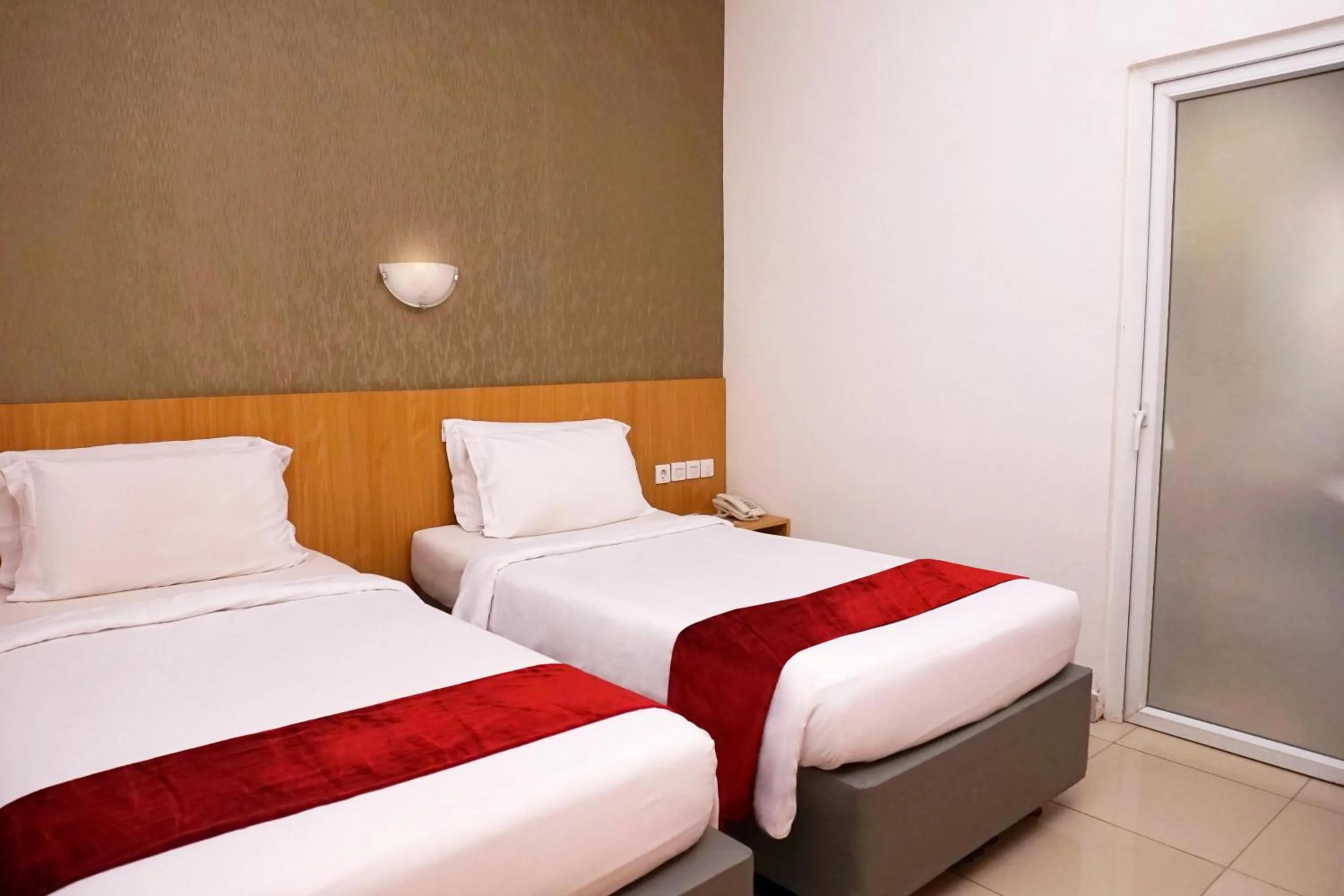 Bed in Marilyn Hotel Serpong