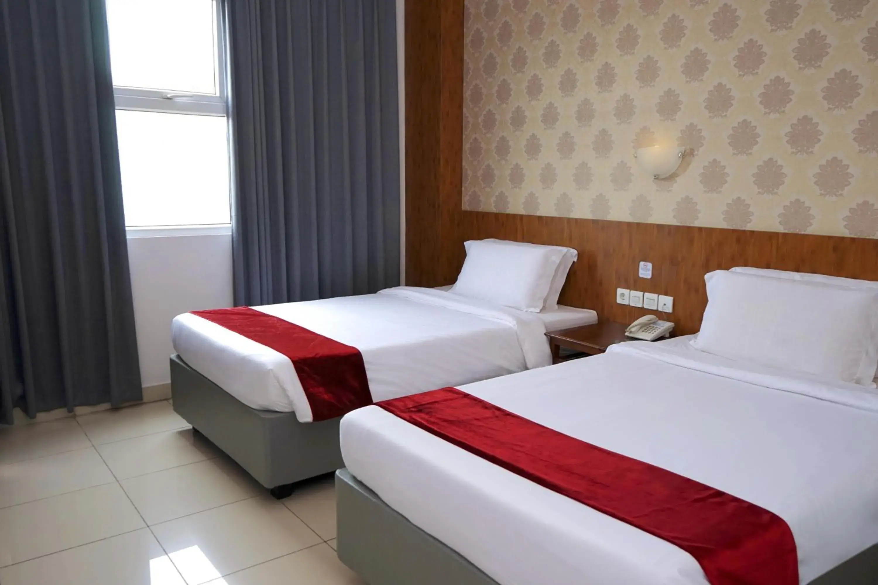 Deluxe Twin Room in Marilyn Hotel Serpong Deluxe Twin Room in Marilyn Hotel Serpong
