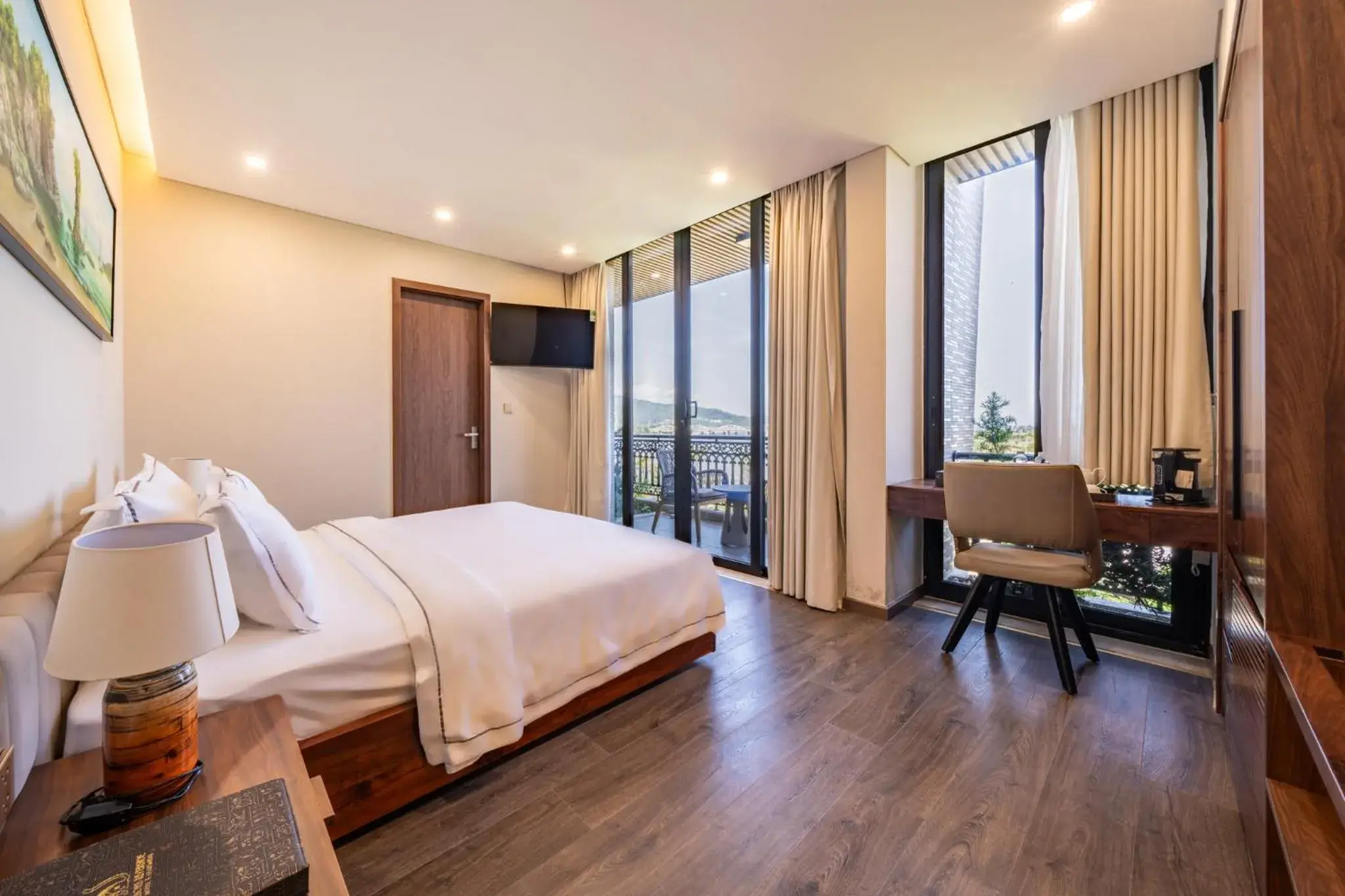 Deluxe Double Room with Balcony in Cami Riverside Resort Da Nang Deluxe Double Room with Balcony in Cami Riverside Resort Da Nang