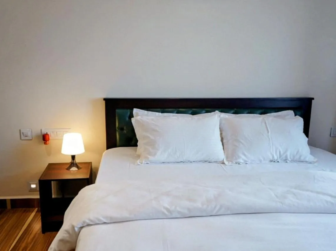 Bed in Coastal Pearl Home Stay, Private Rooms & Villas Murudeshwar