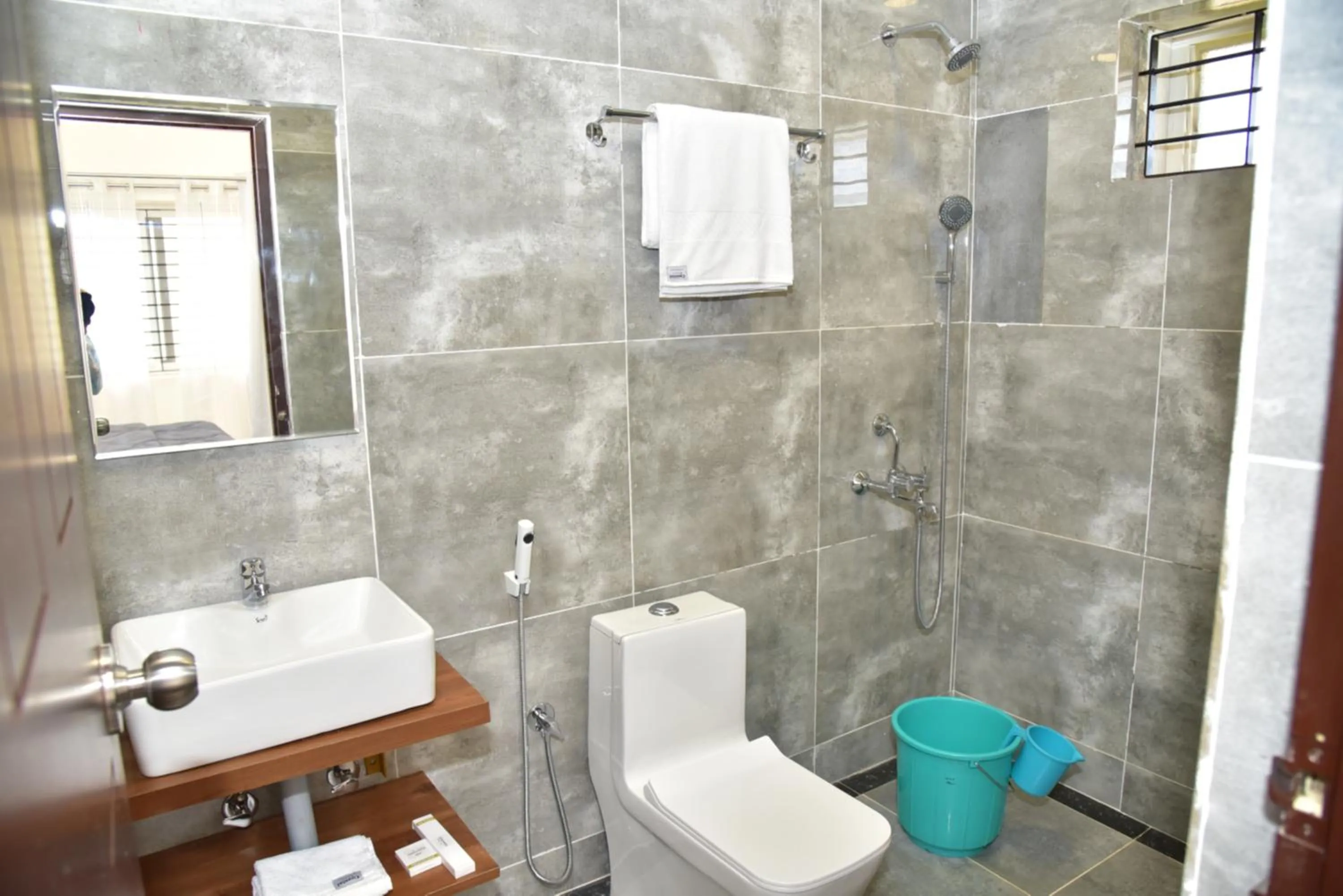 Shower in Coastal Pearl Home Stay, Private Rooms & Villas Murudeshwar