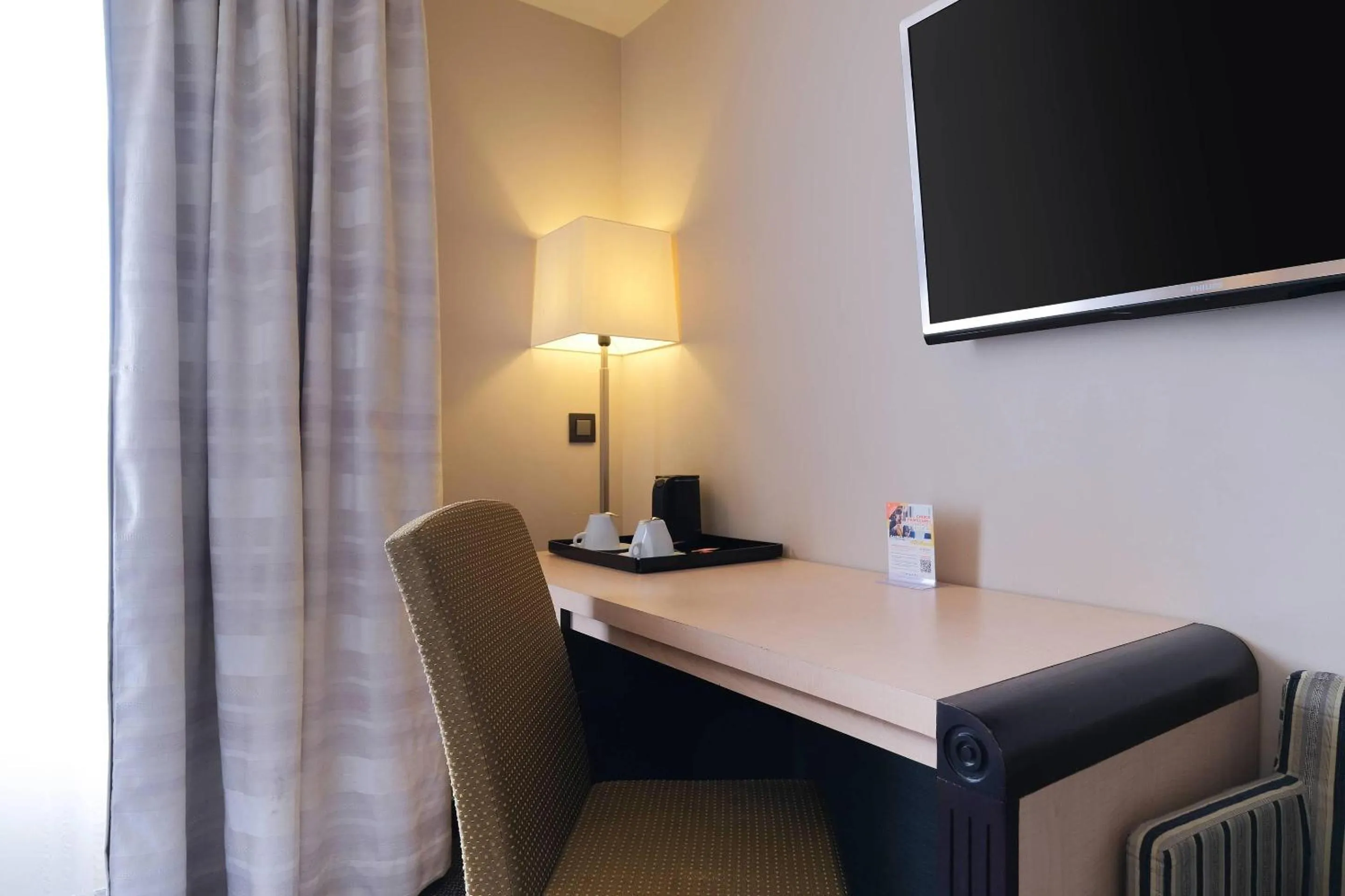 Bedroom in Zenitude Hotel La Valadière, Ascend Hotel Collection