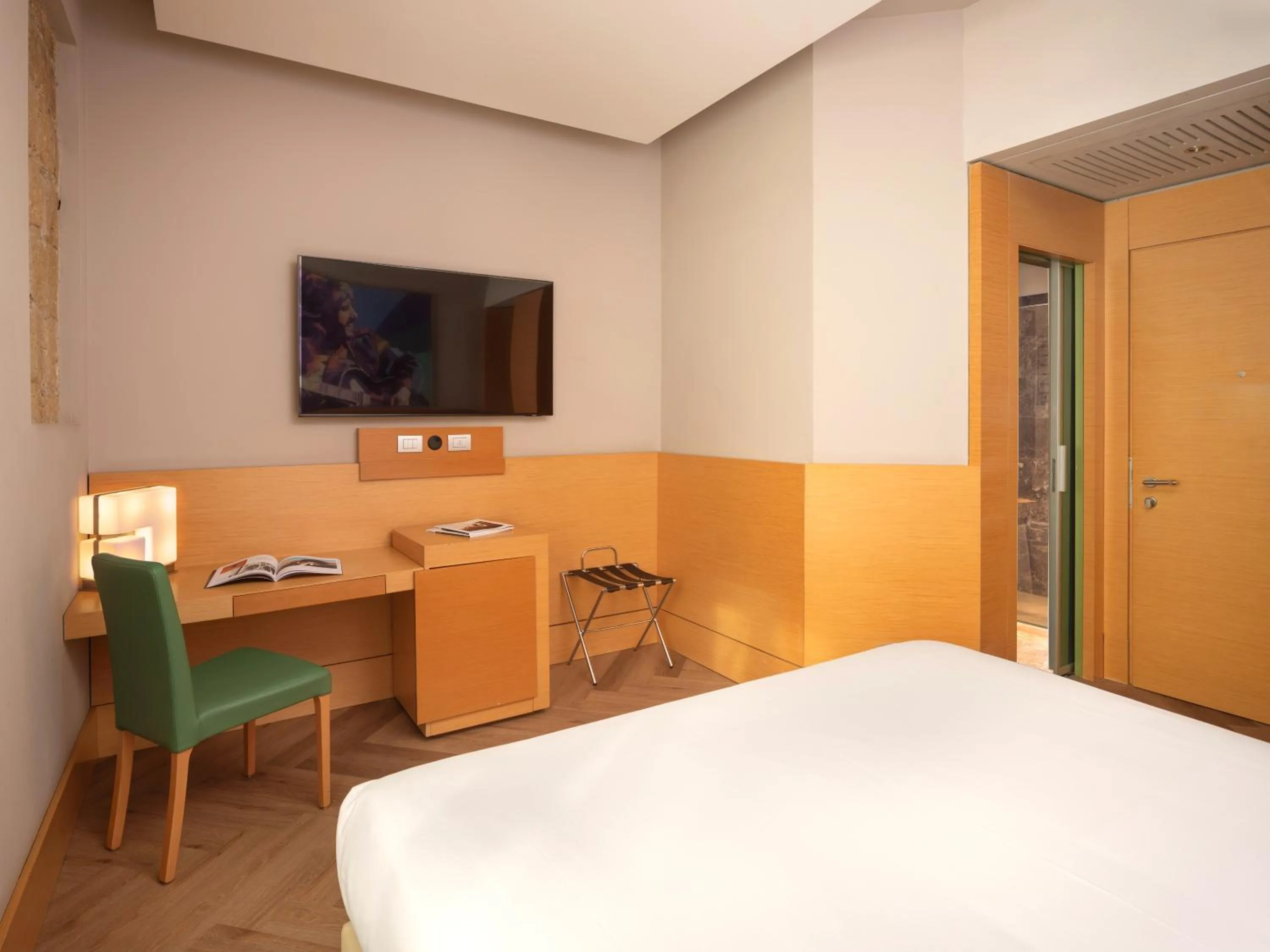 Bed in UNA Hotels Napoli