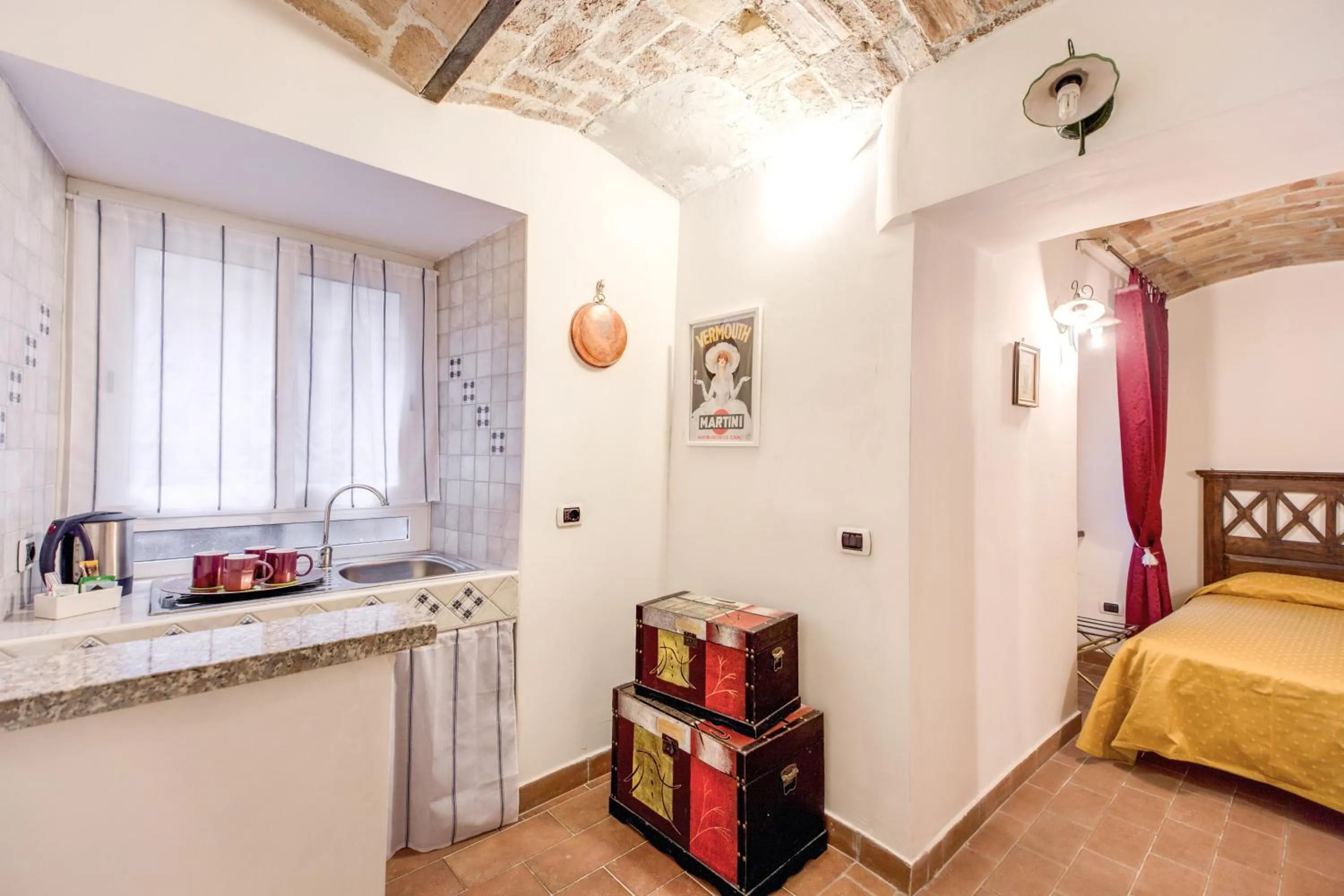 Kitchen or kitchenette, Bed in Hotel Gea Di Vulcano