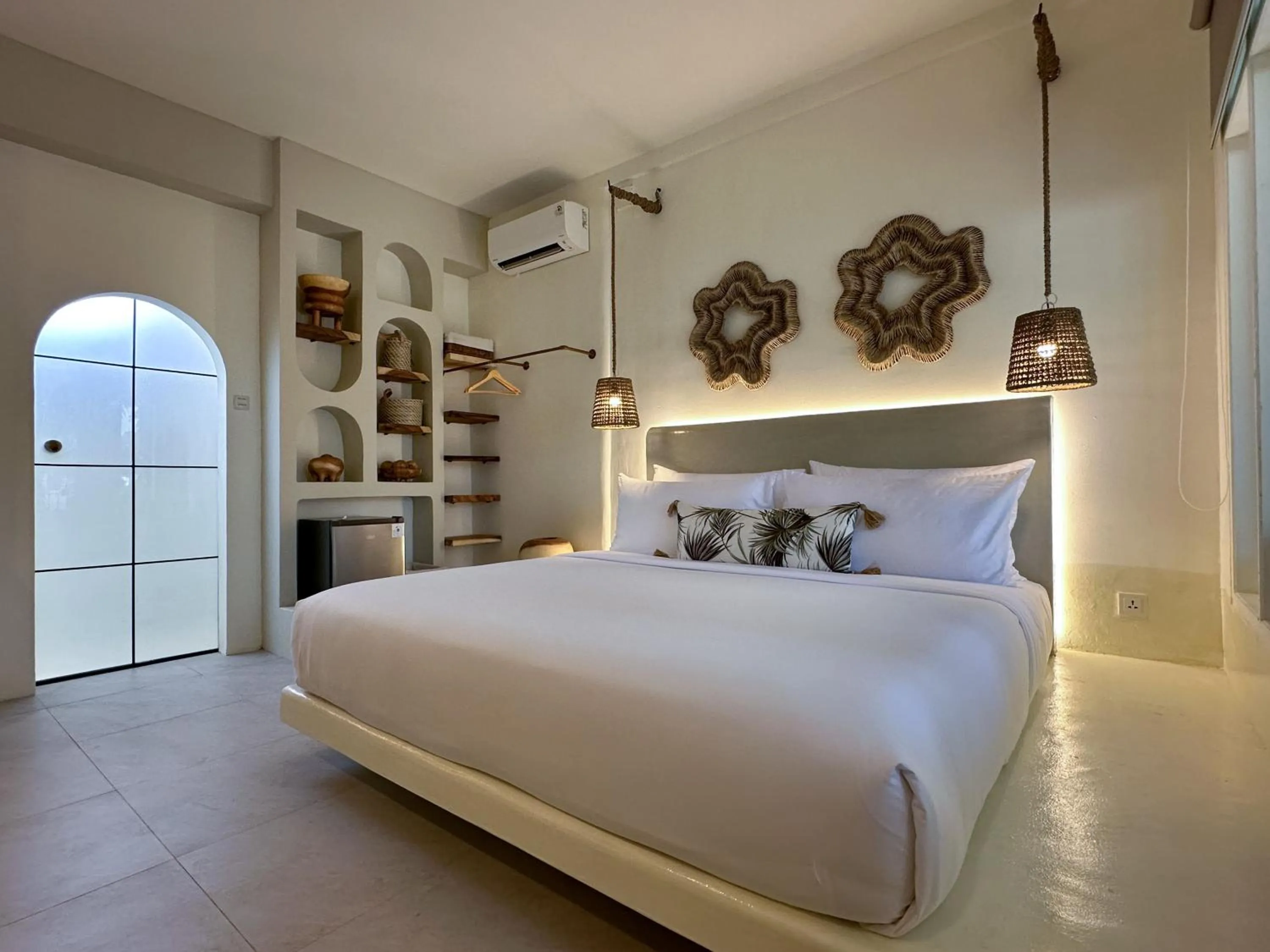 Bed in El Tropico Boutique Hotel
