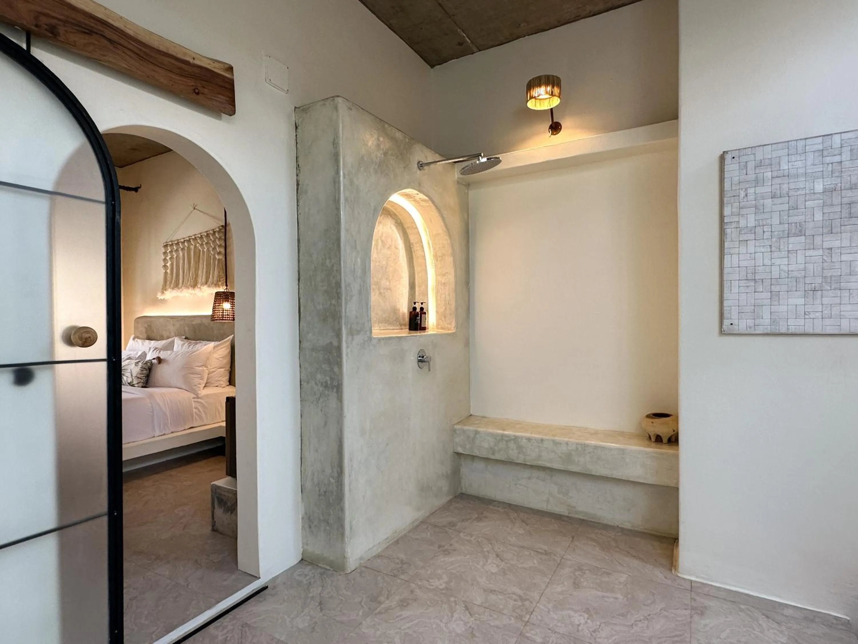 Bed in El Tropico Boutique Hotel