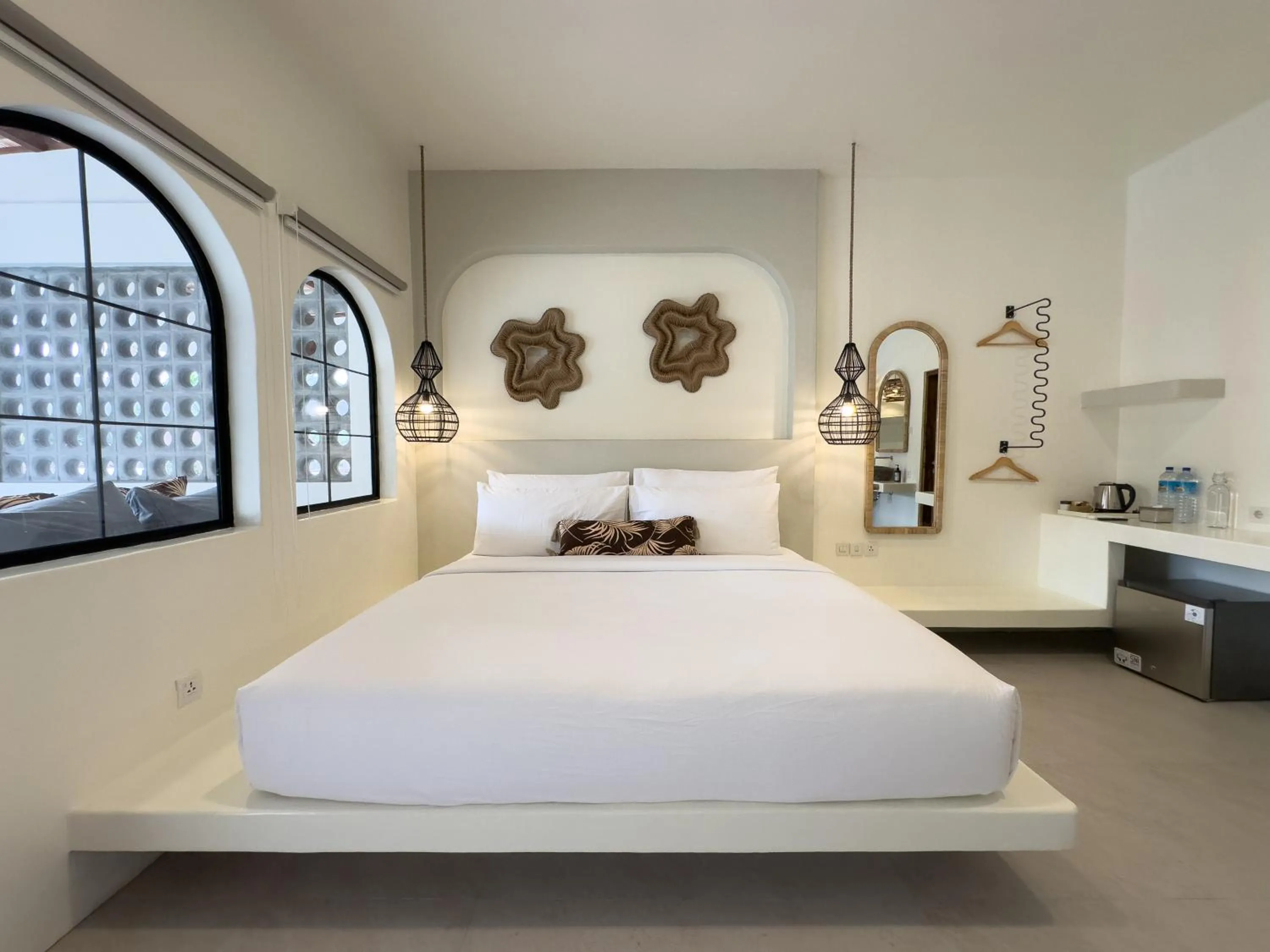 Bed in El Tropico Boutique Hotel