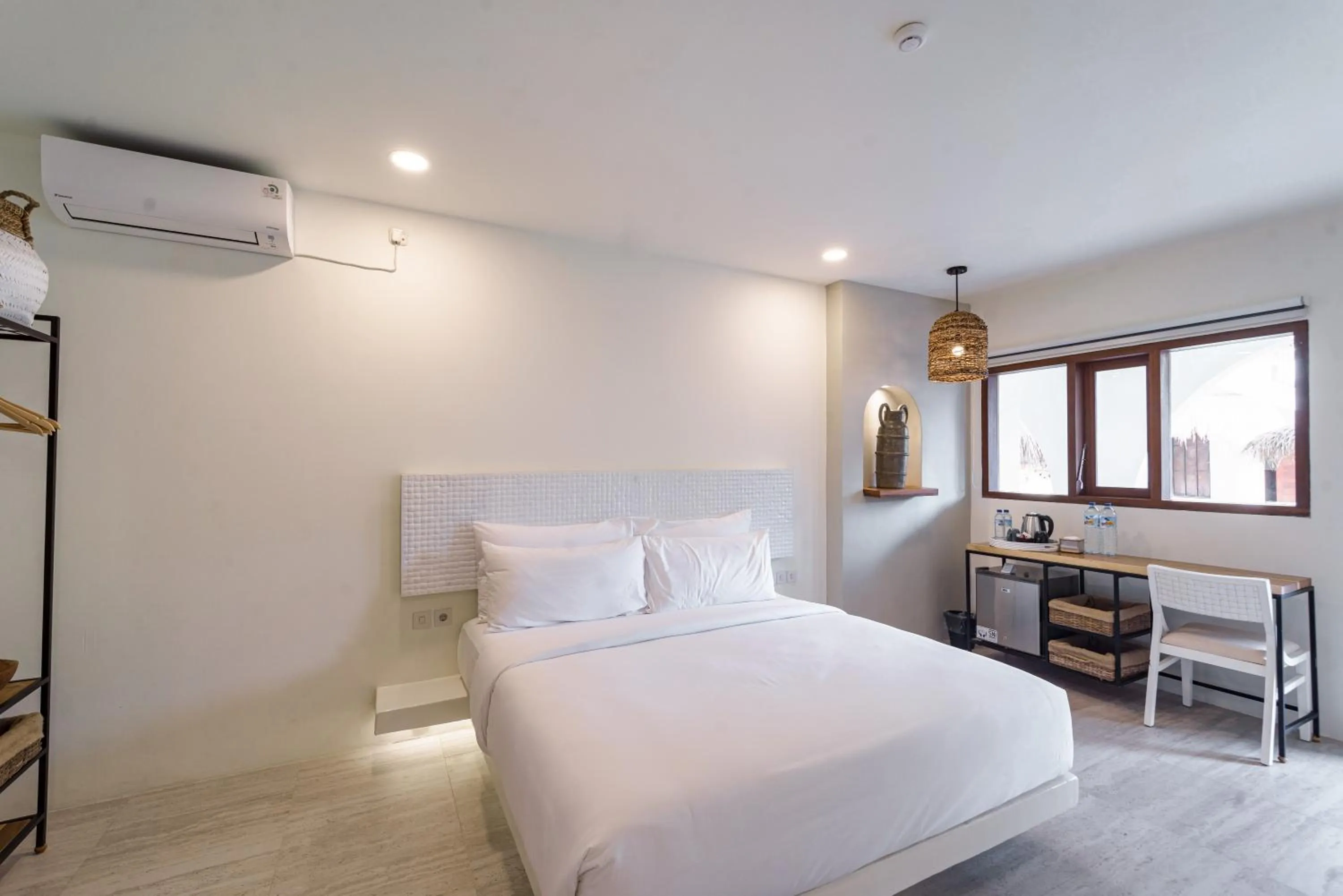 Bed in El Tropico Boutique Hotel