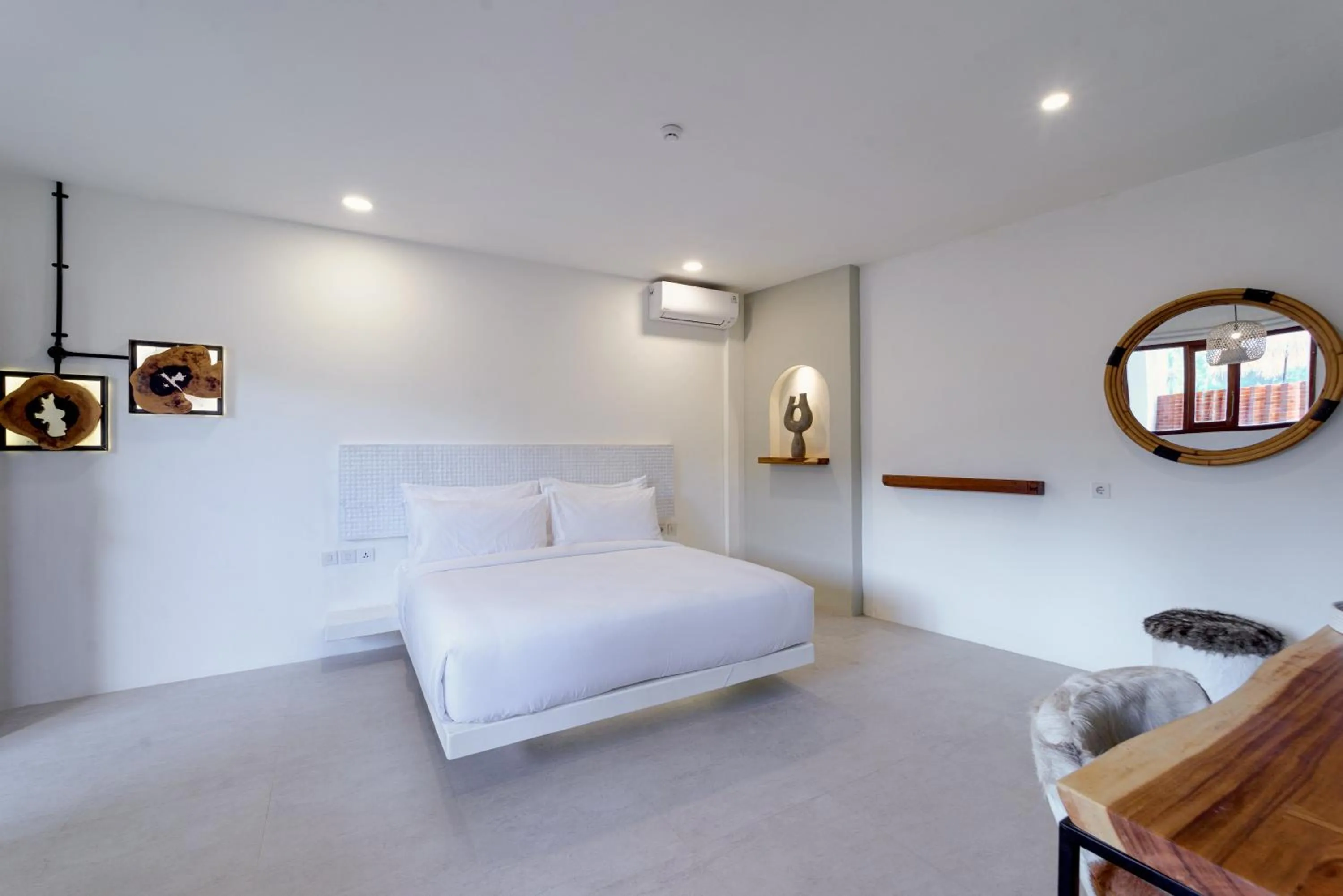 Bed in El Tropico Boutique Hotel