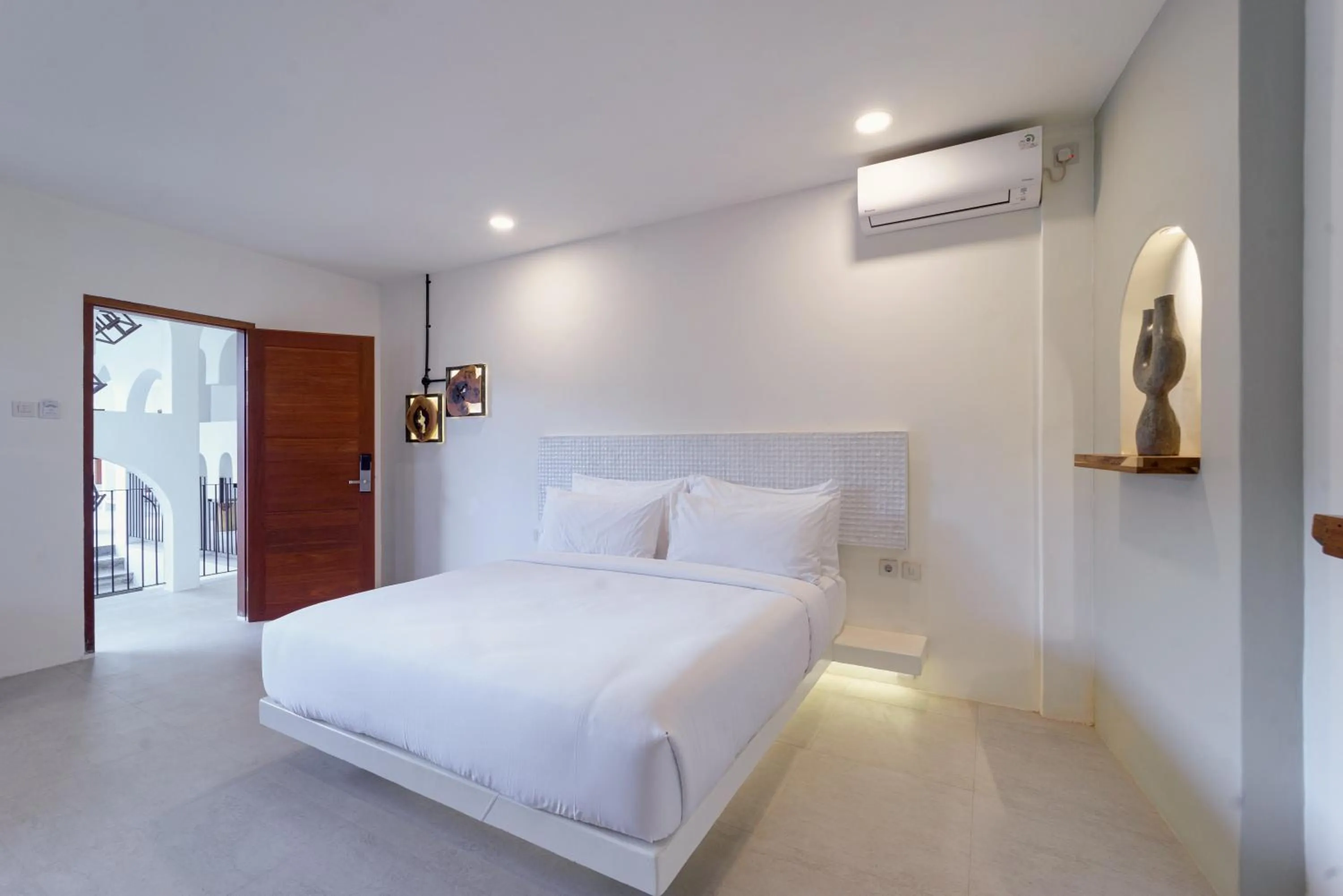 Bed in El Tropico Boutique Hotel