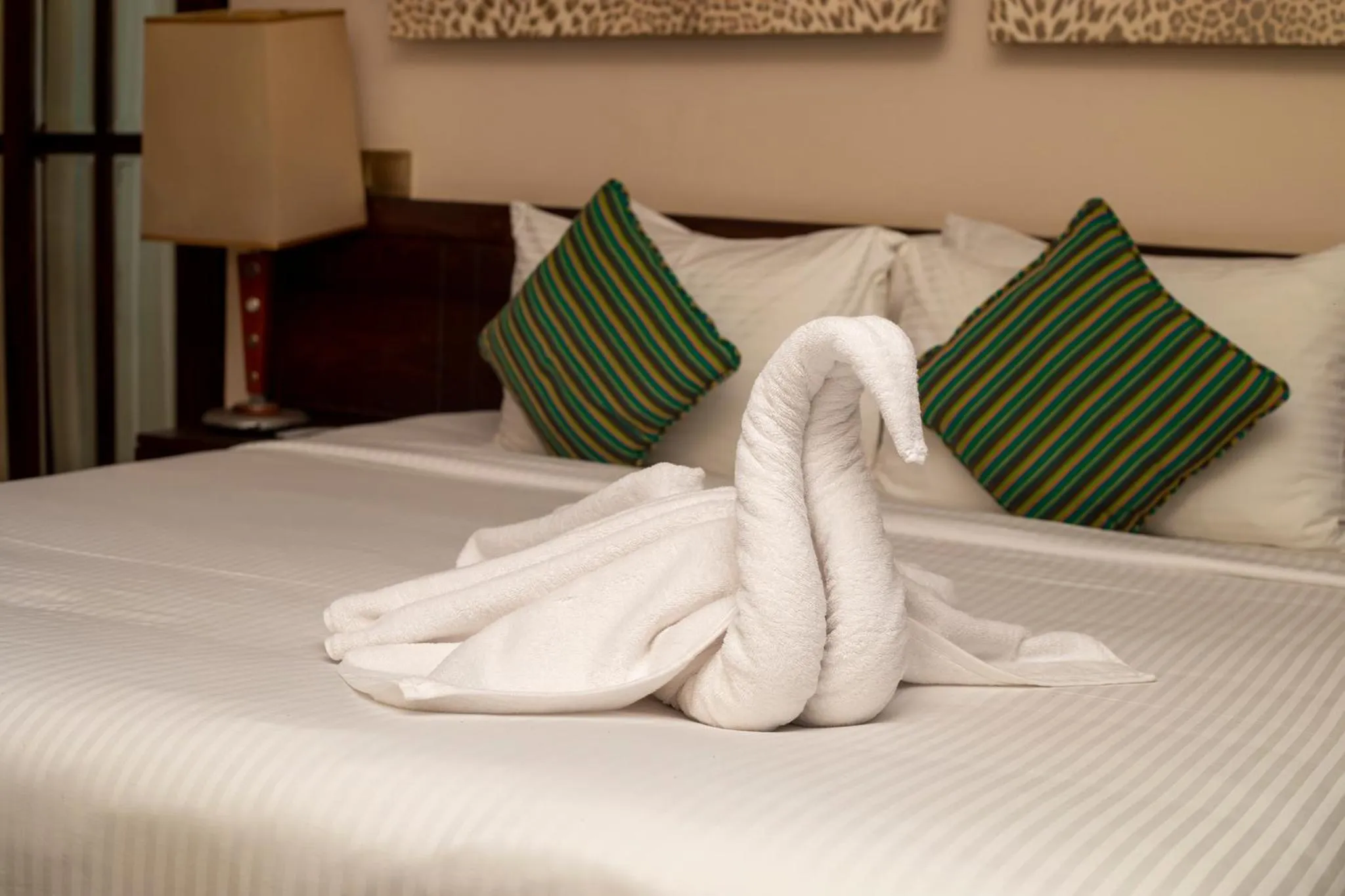 Bed in NIKARA Luxury Beach House