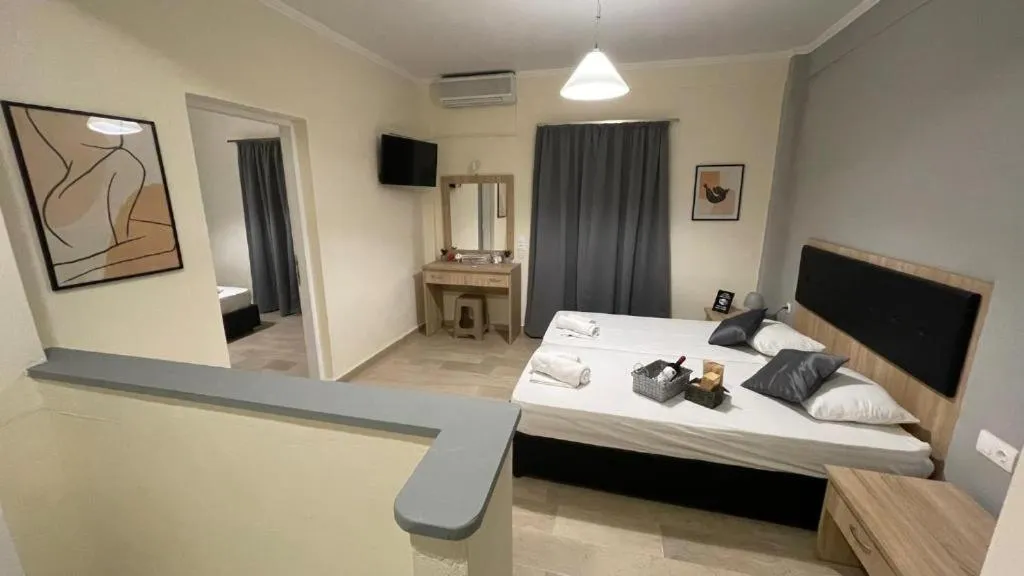 Bed in Ionian Boutique Apartments - Corfu Seaside Getaways