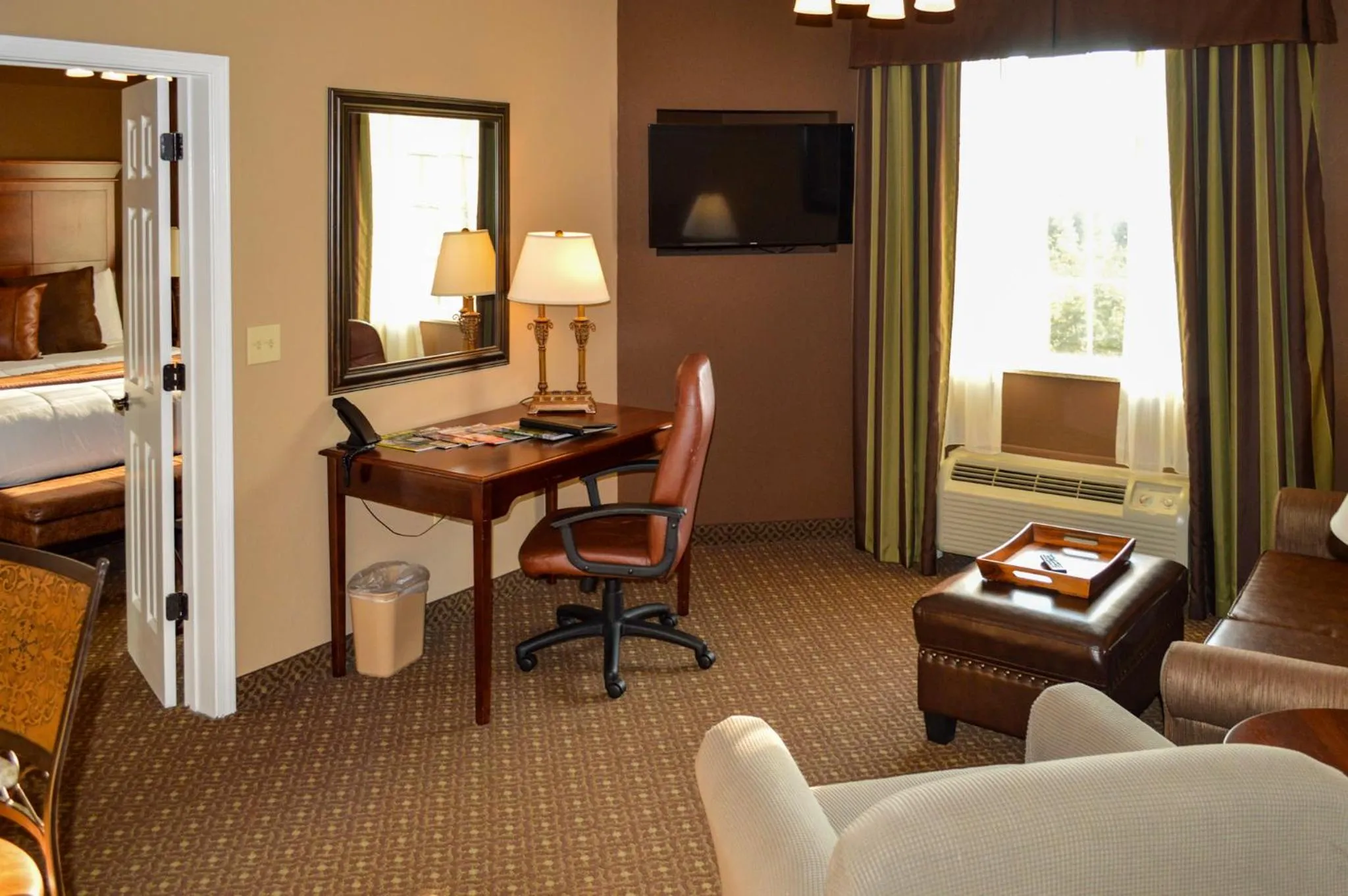 Living room, Bed in The Lodge at Flat Rock