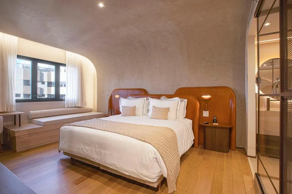 Bed in QOYA Hotel Curitiba, Curio Collection by Hilton