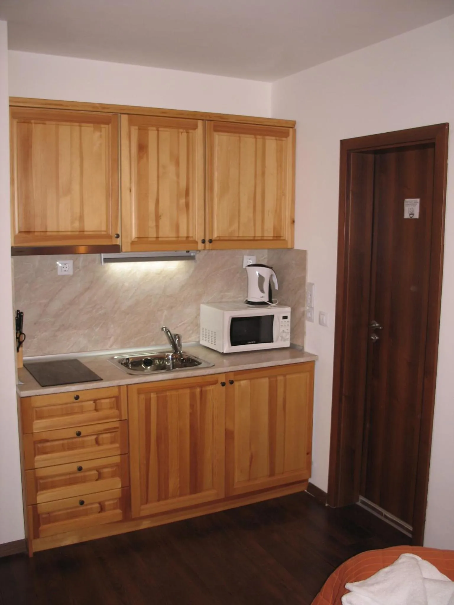 Kitchen or kitchenette in Winslow Infinity Aparthotel