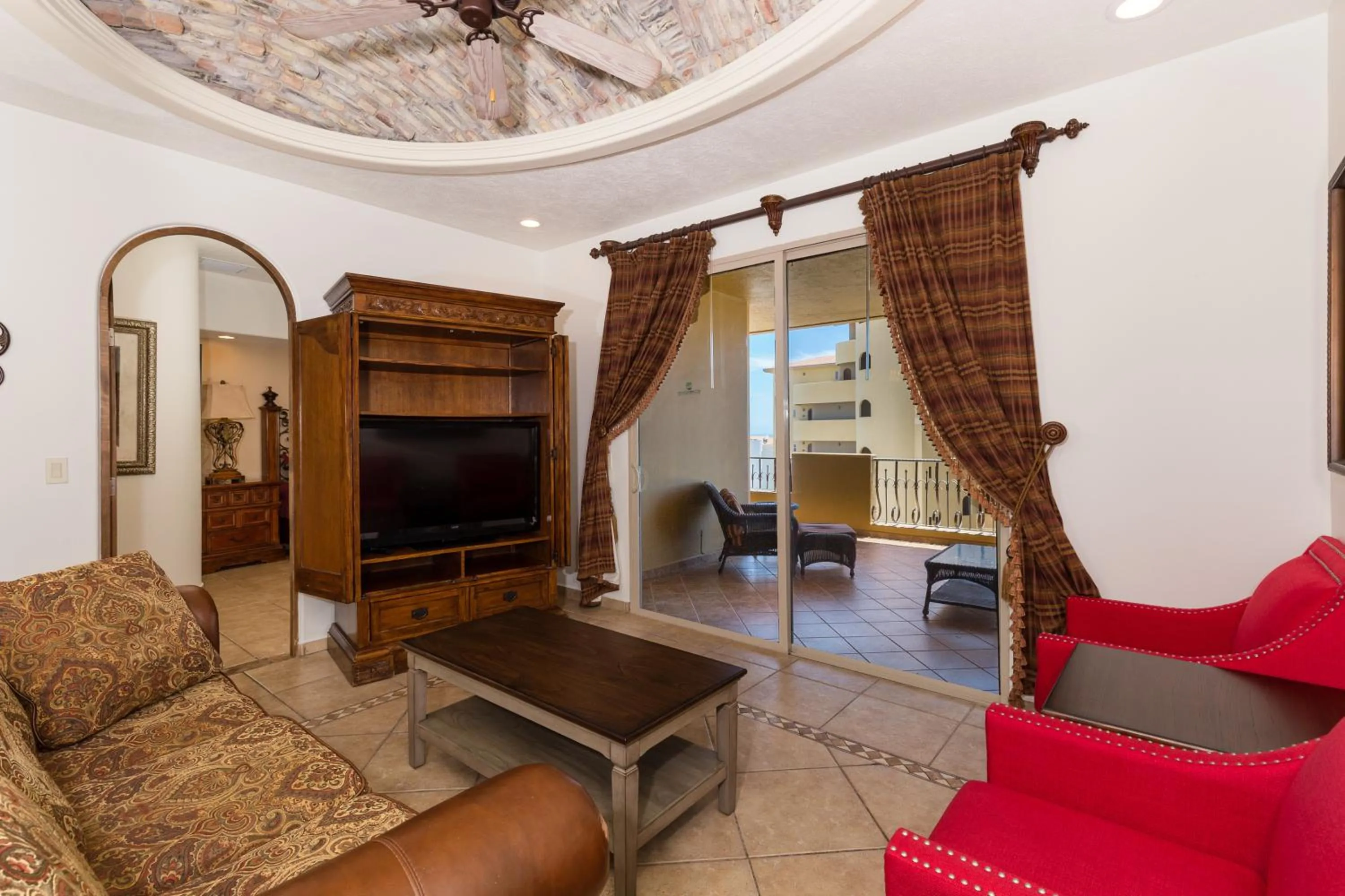 TV and multimedia in Bella Sirena 601-B -Stylish Condo in Oceanfront Resort