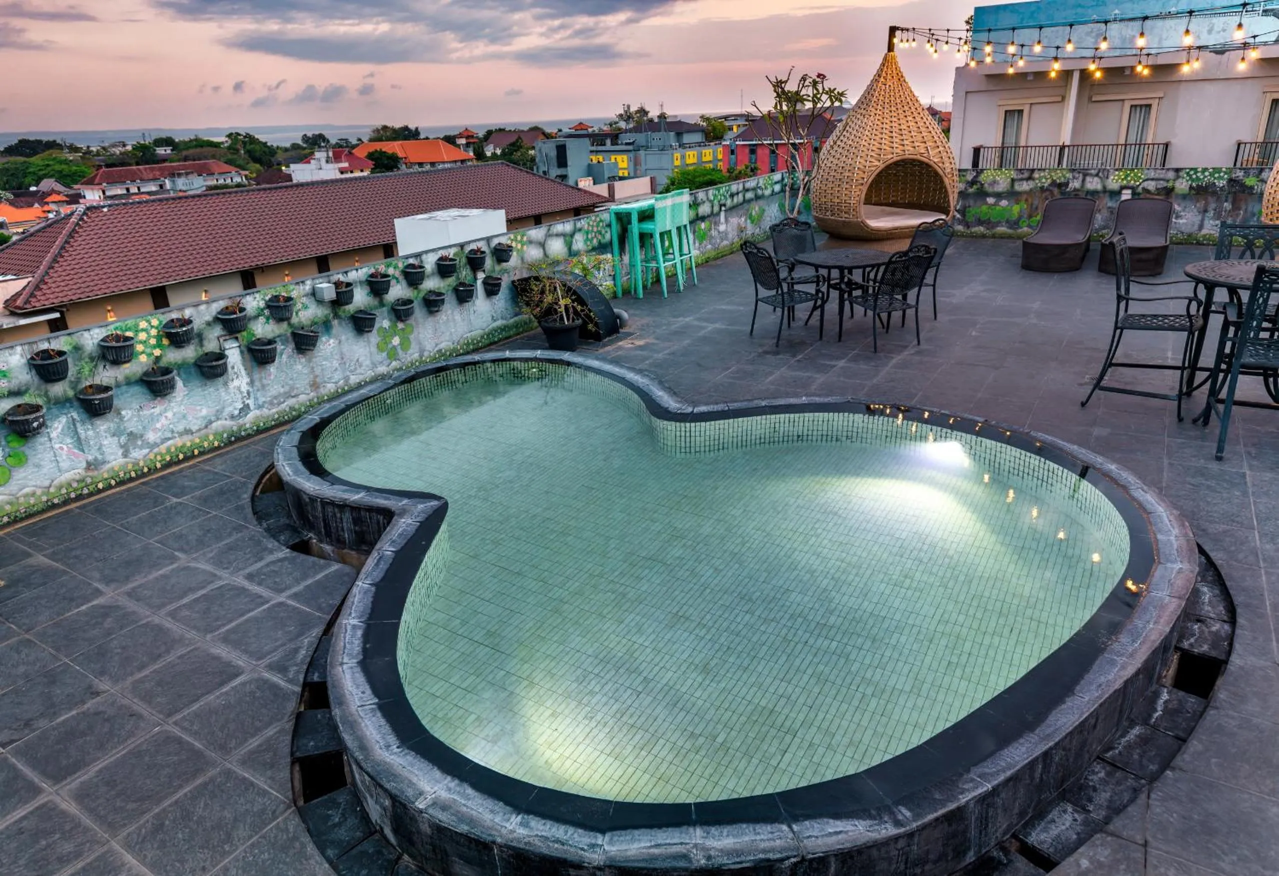 Swimming pool in Boss Legian Hotel Powered by Archipelago