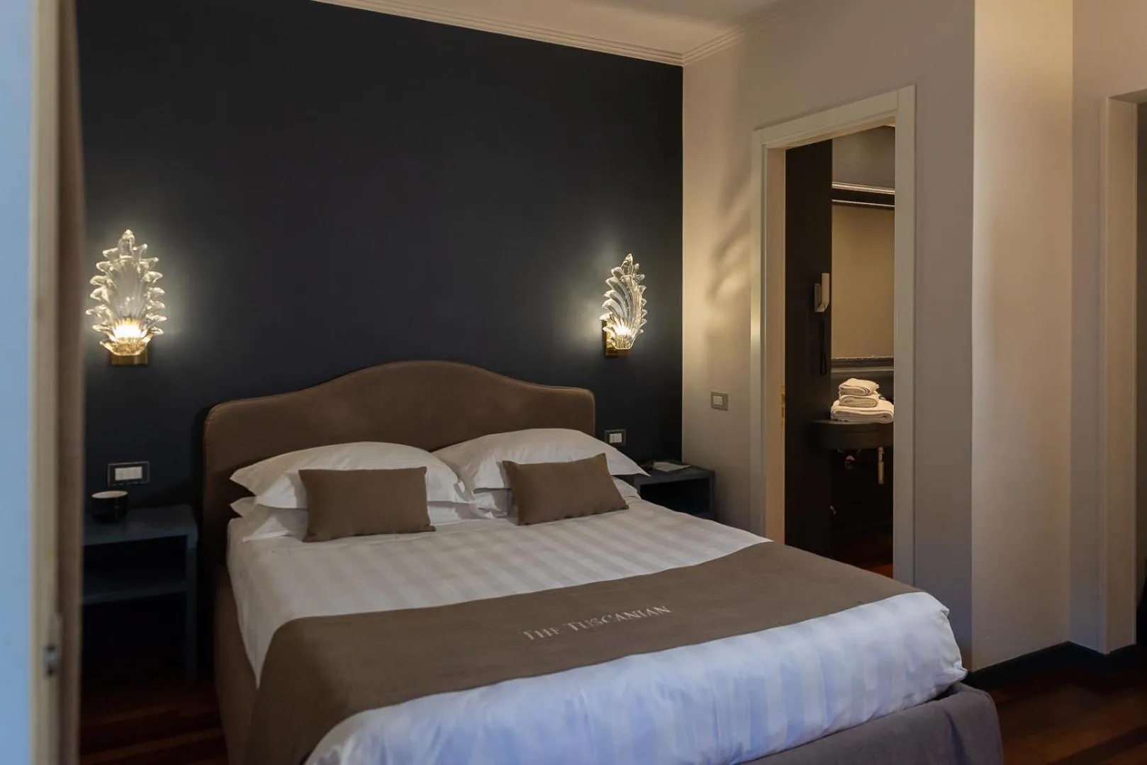 Bed in The Tuscanian Hotel