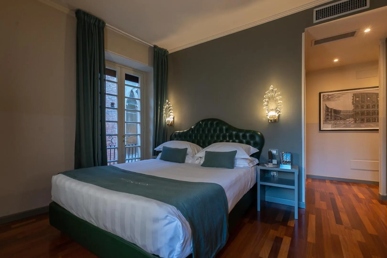 Bed in The Tuscanian Hotel