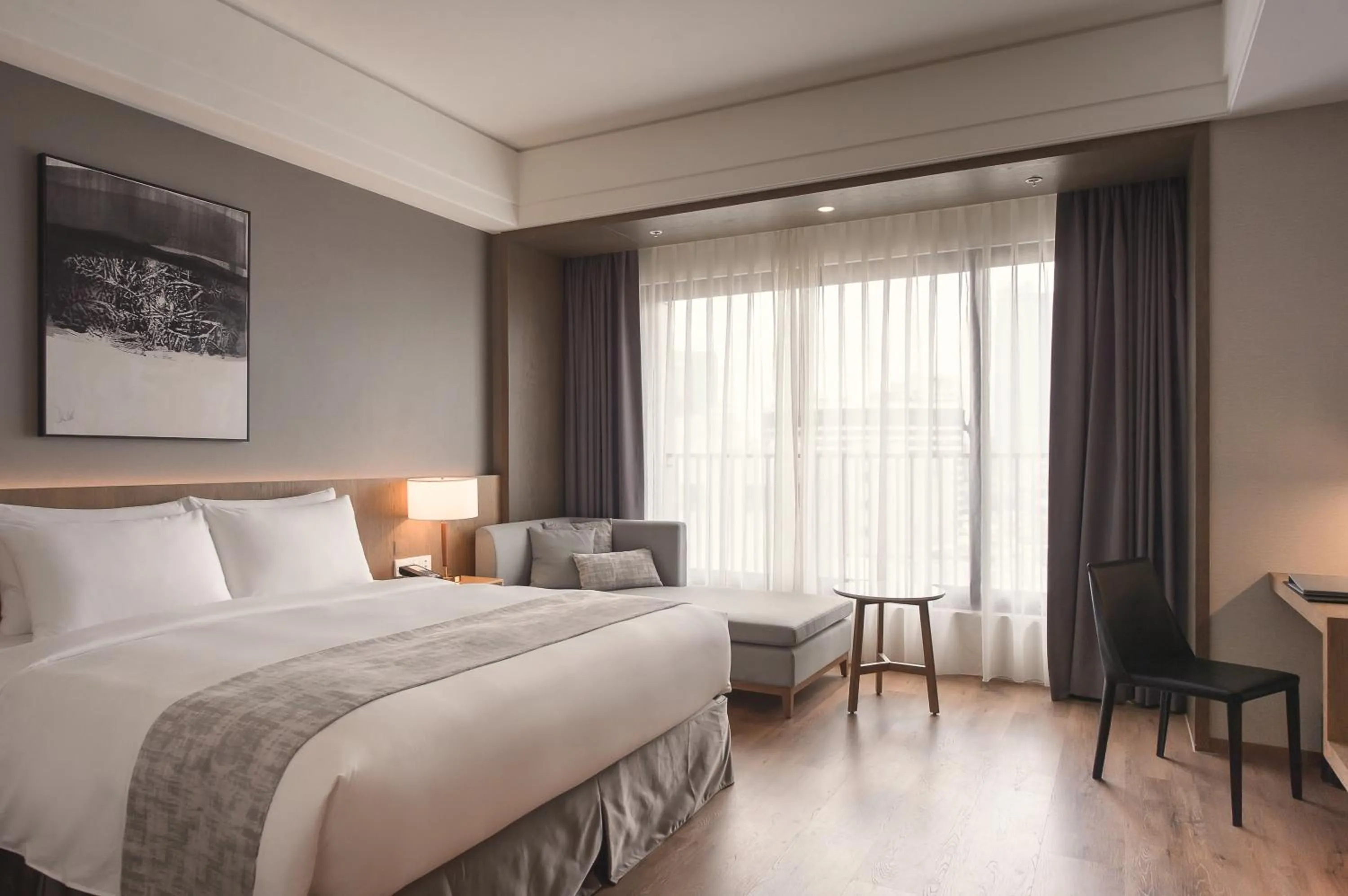 Bed in Grand Banyan Hotel