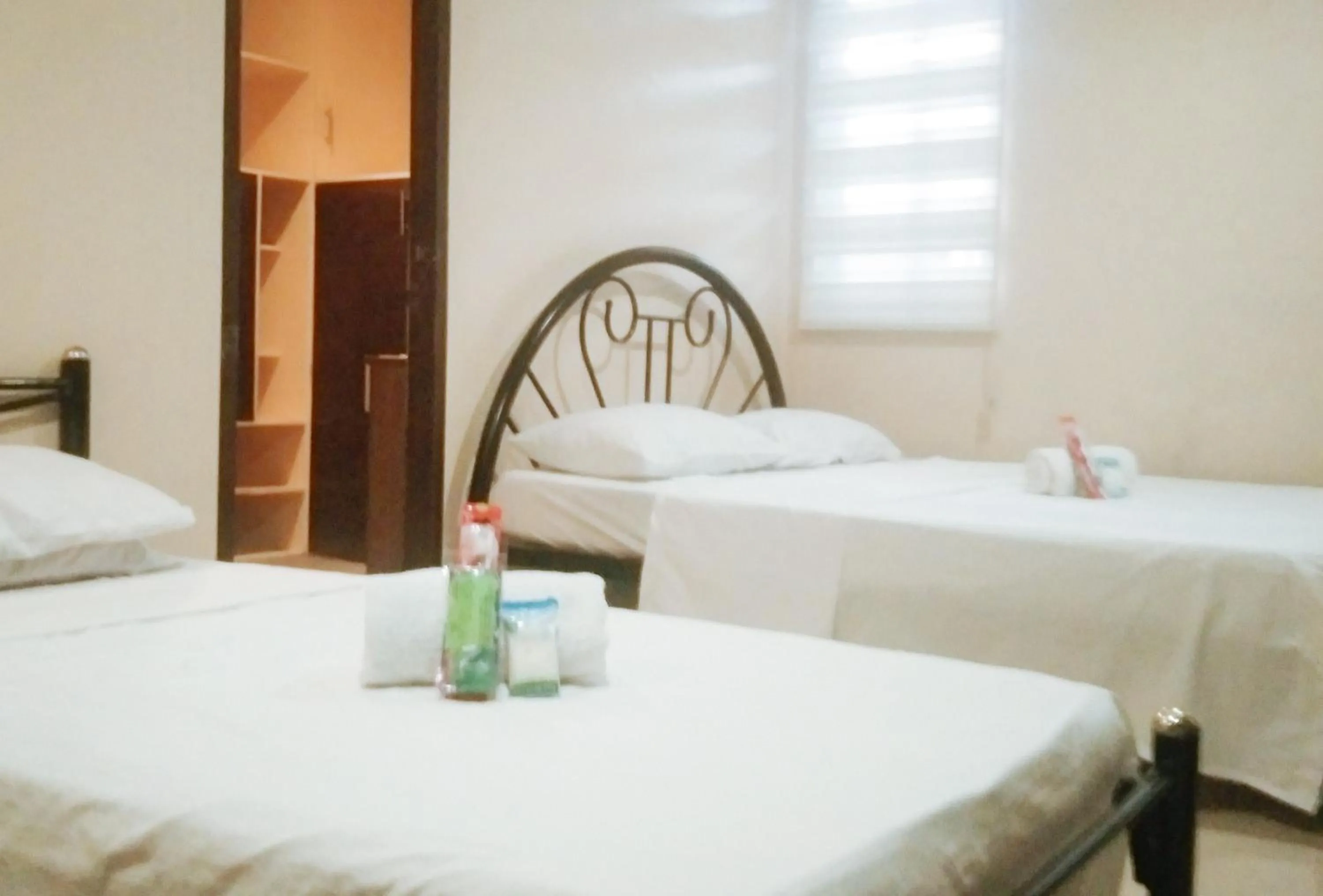 Bedroom, Bed in Skyleigh Apartelle by RedDoorz