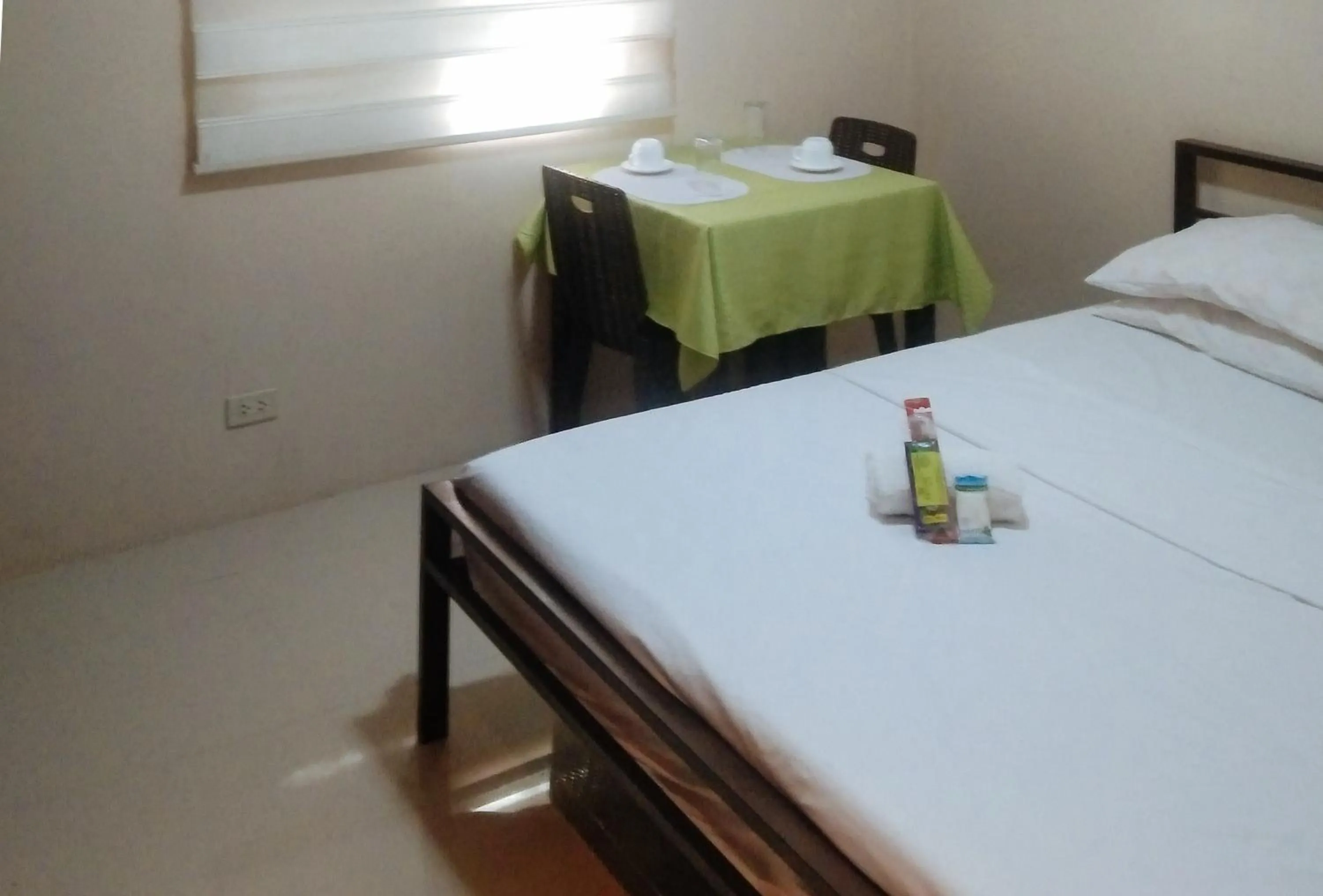 Bedroom, Bed in Skyleigh Apartelle by RedDoorz