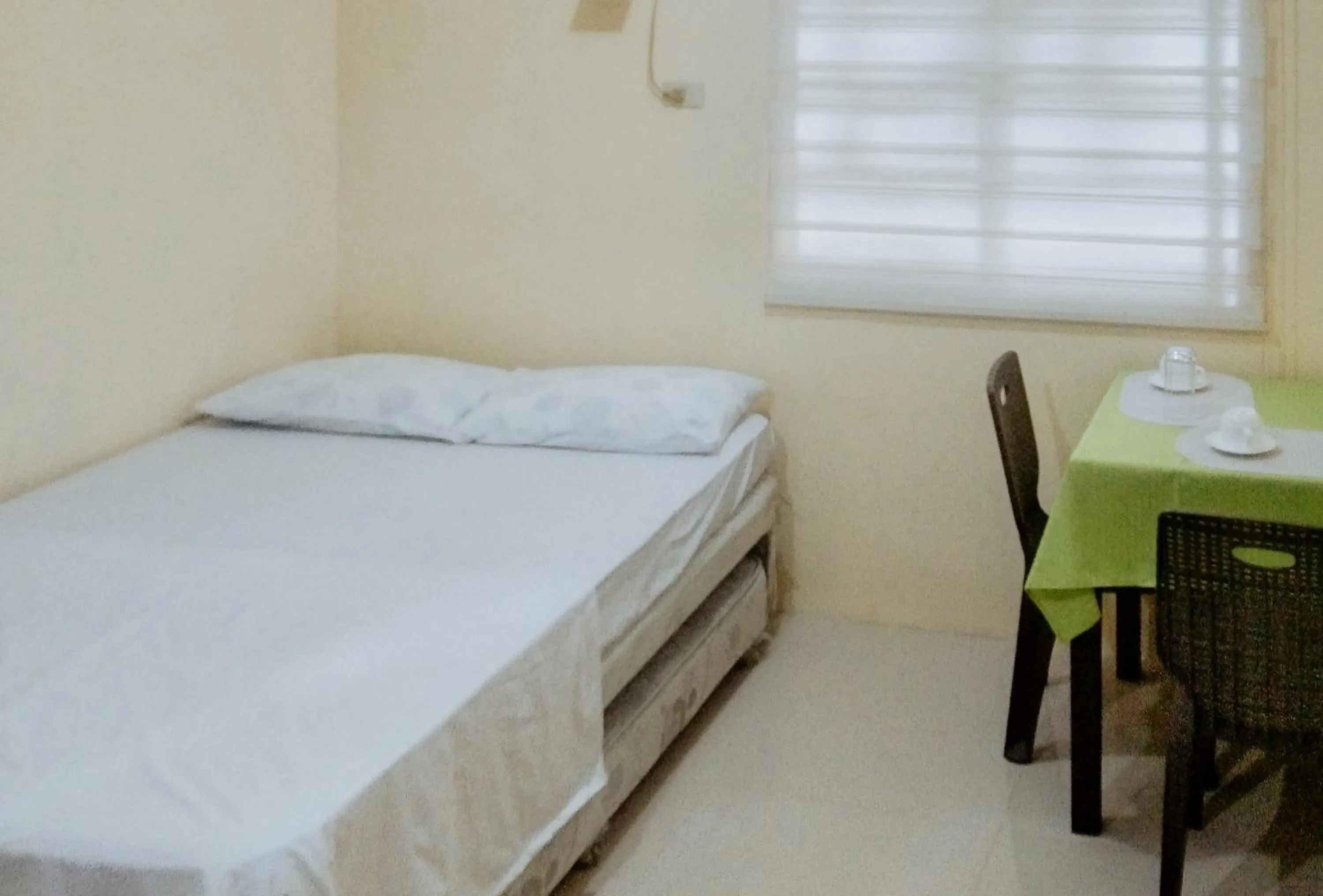 Bedroom, Bed in Skyleigh Apartelle by RedDoorz