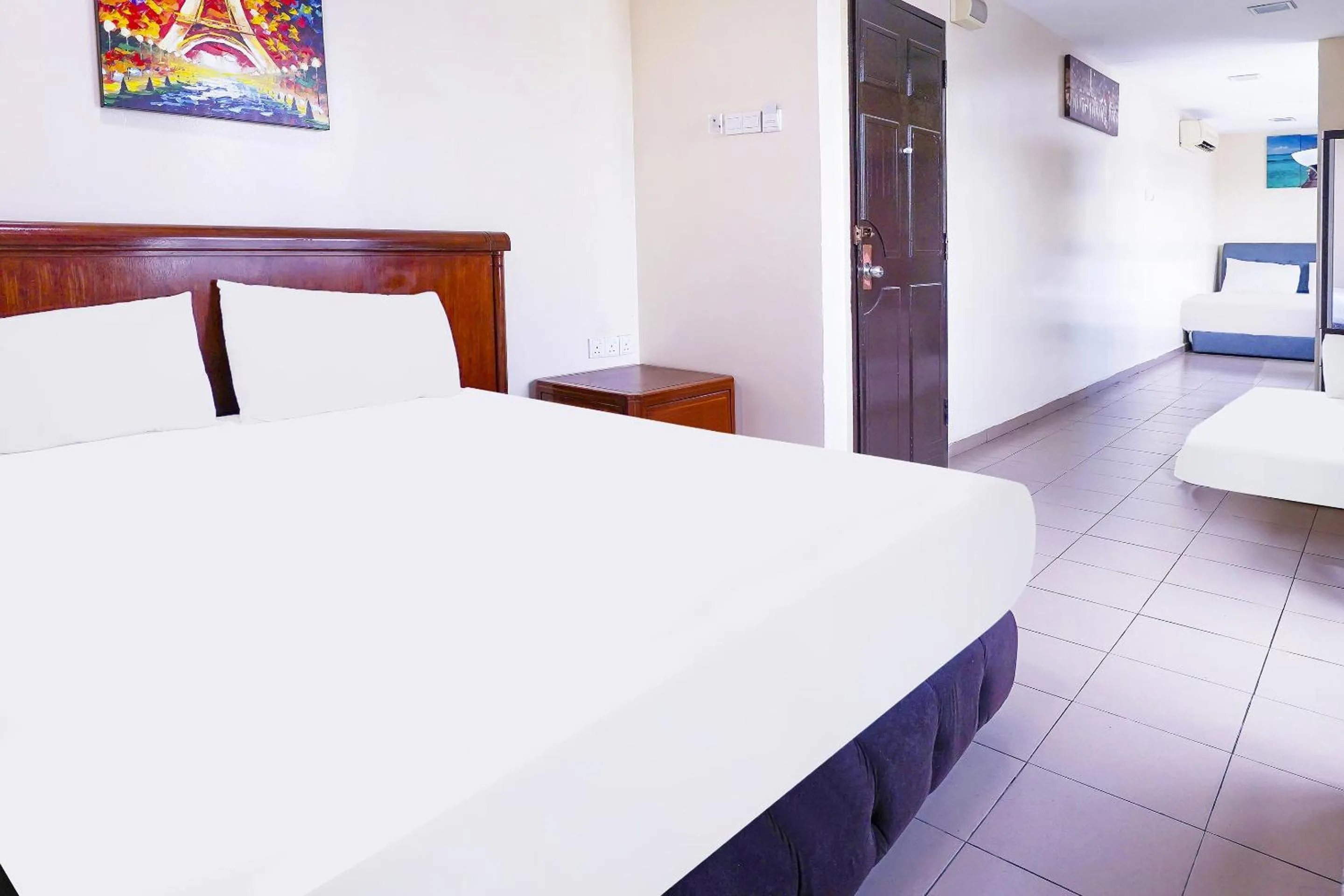 Family Room in OYO 90486 New Station Hotel