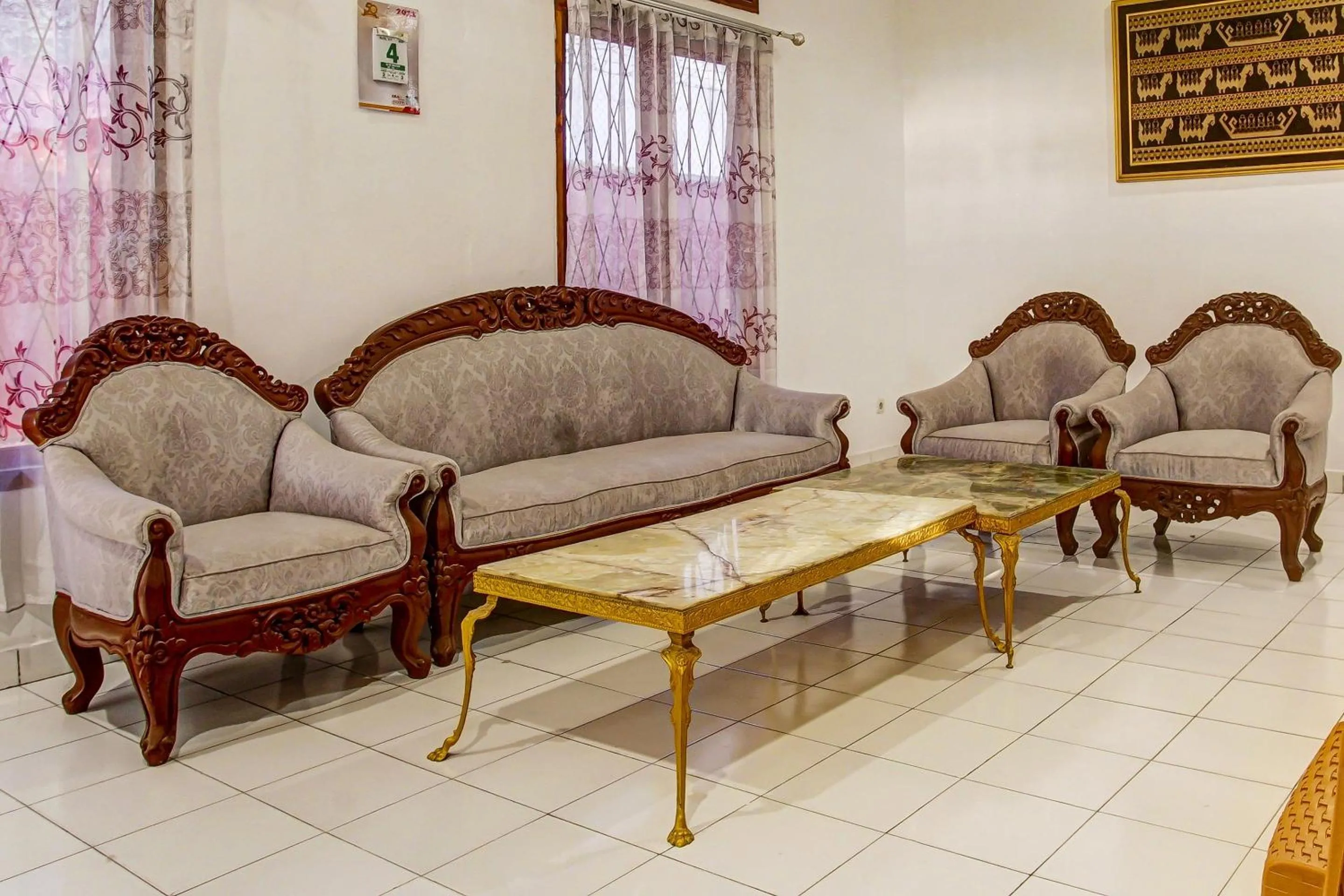 Lobby or reception in Hotel O Homestay Syariah
