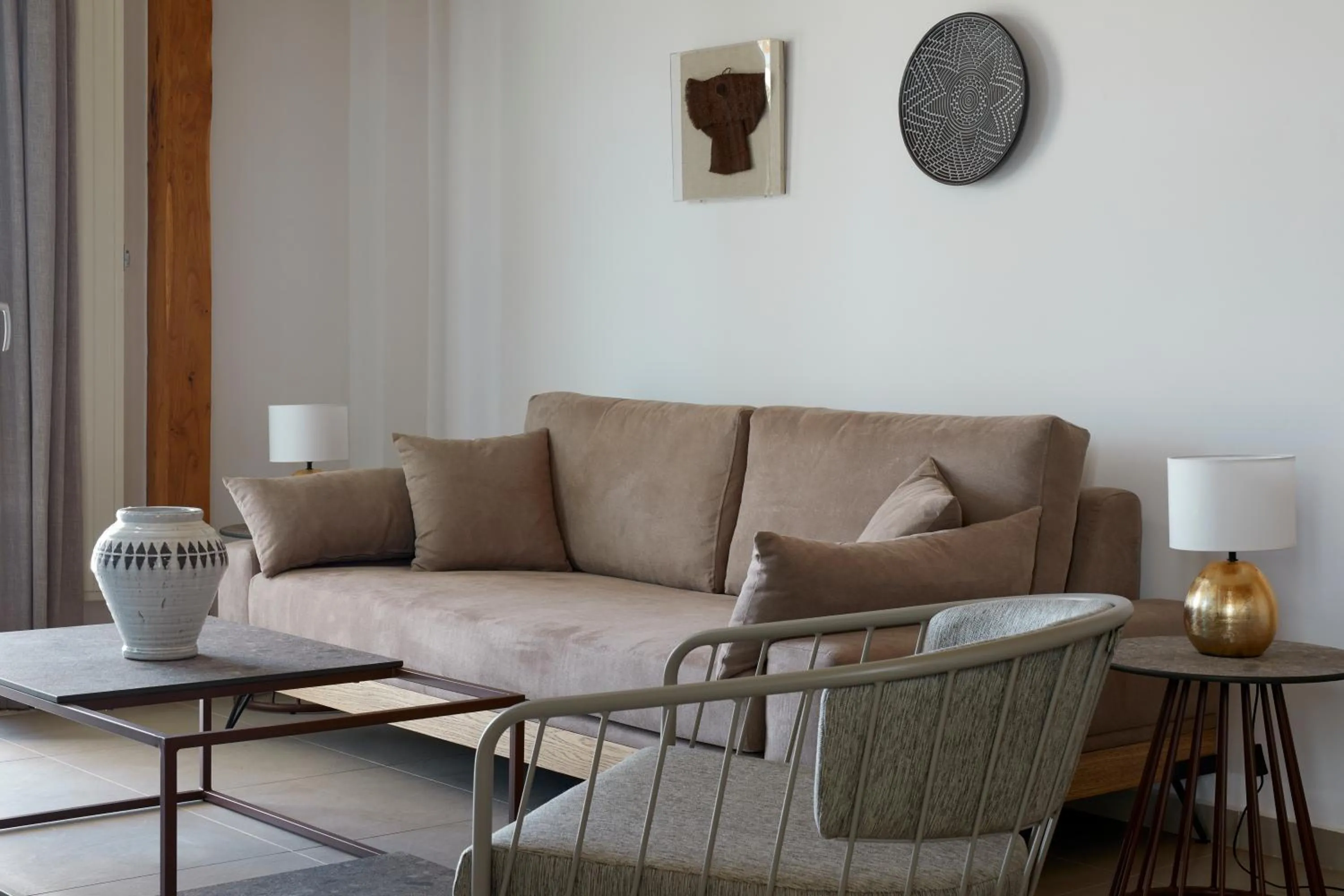 Living room in Sea Breeze Santorini Beach Resort, Curio By Hilton