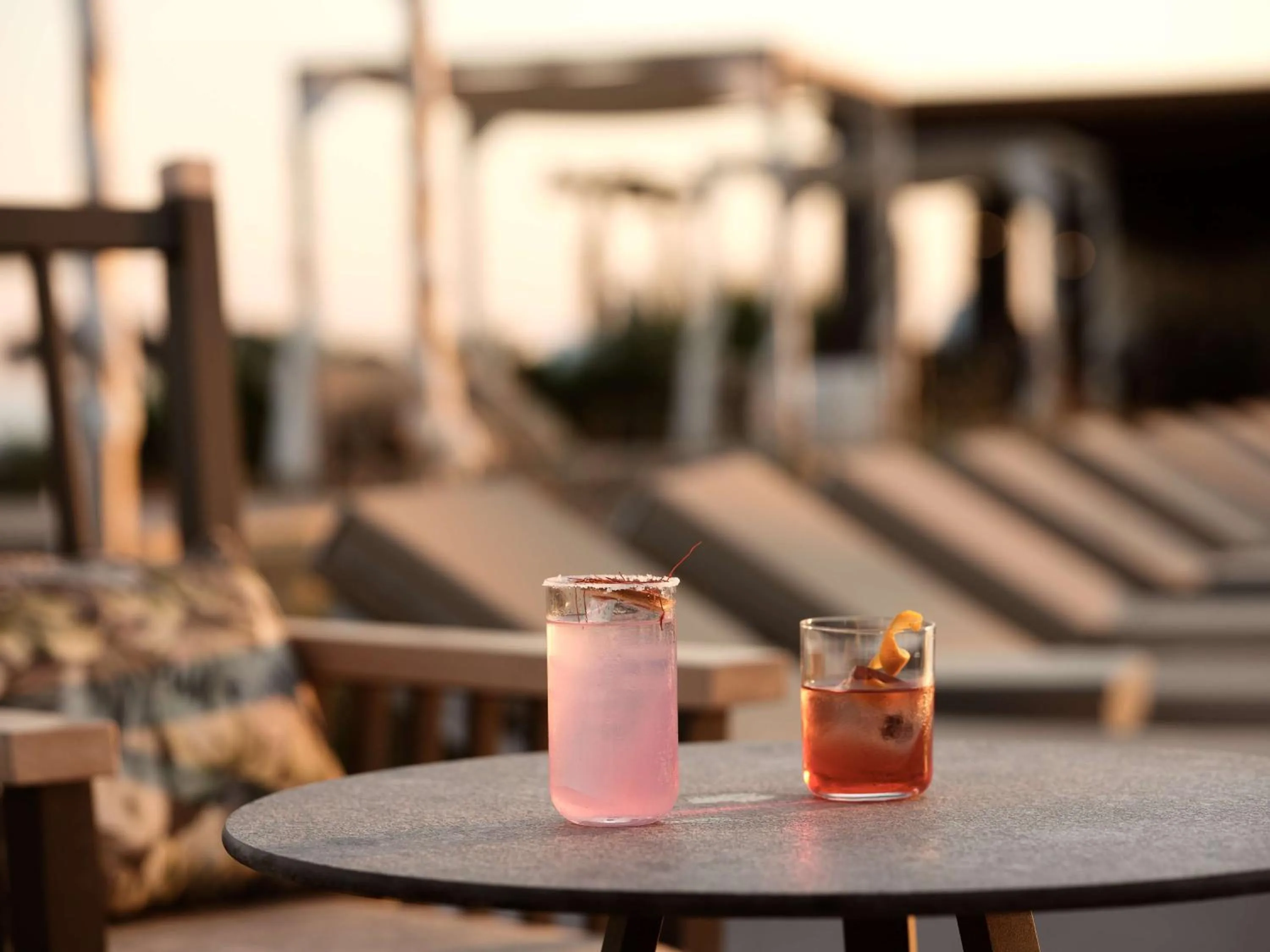 Dining area in Sea Breeze Santorini Beach Resort, Curio By Hilton